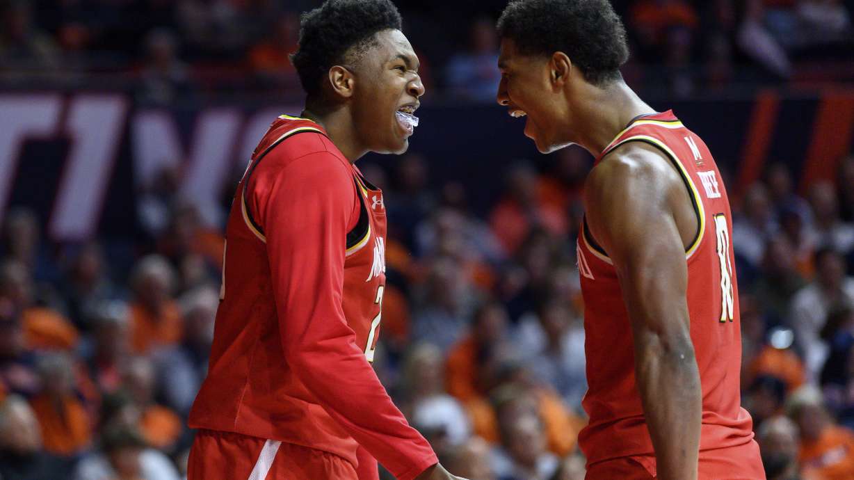 Maryland's Derik Queen and Julian Reese celebrate during the second half of an NCAA college basketball game against Illinois, Thursday, Jan. 23, 2025, in Champaign, Ill.