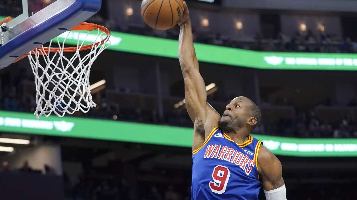 FILE - Golden State Warriors forward Andre Iguodala (9) dunks against the Chicago Bulls during the second half of an NBA basketball game in San Francisco, Friday, Nov. 12, 2021.