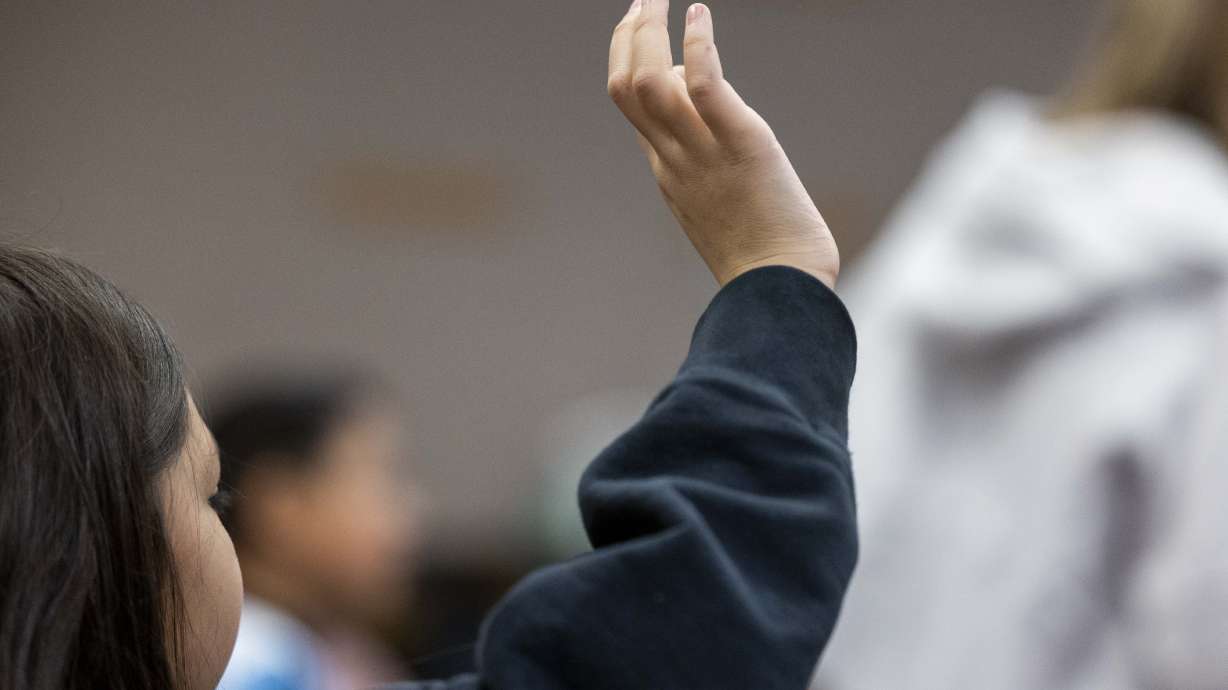 A student at Crescent Elementary School in Sandy on Jan. 13. Thirty-seven public education programs in Utah have sunset review dates, and a bill looking to add more programs to that list sparked debate on Monday.