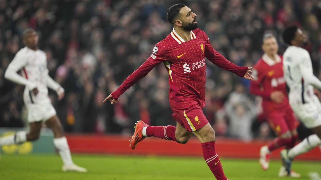 Liverpool's Mohamed Salah celebrates after scoring his side's first goal during the Champions League, opening phase soccer match between Liverpool and Lille at Anfield Stadium, Liverpool, England, Tuesday, Jan.21, 2025.