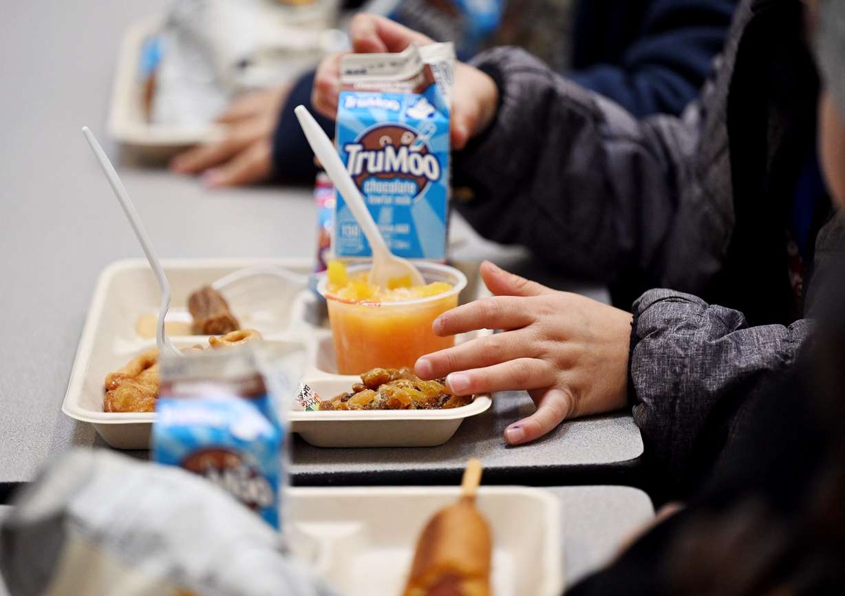 Kids at Butler Elementary school in Cottonwood Heights eat their lunches on Tuesday.
