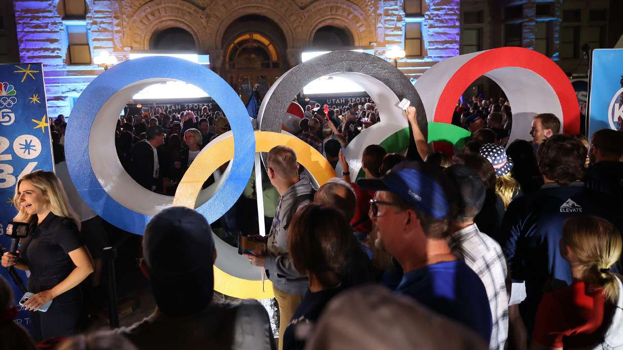 Attendees cheer during a live watch party held at the Salt Lake City and County Building in Washington Square Park on July 24, 2024, in downtown Salt Lake City.