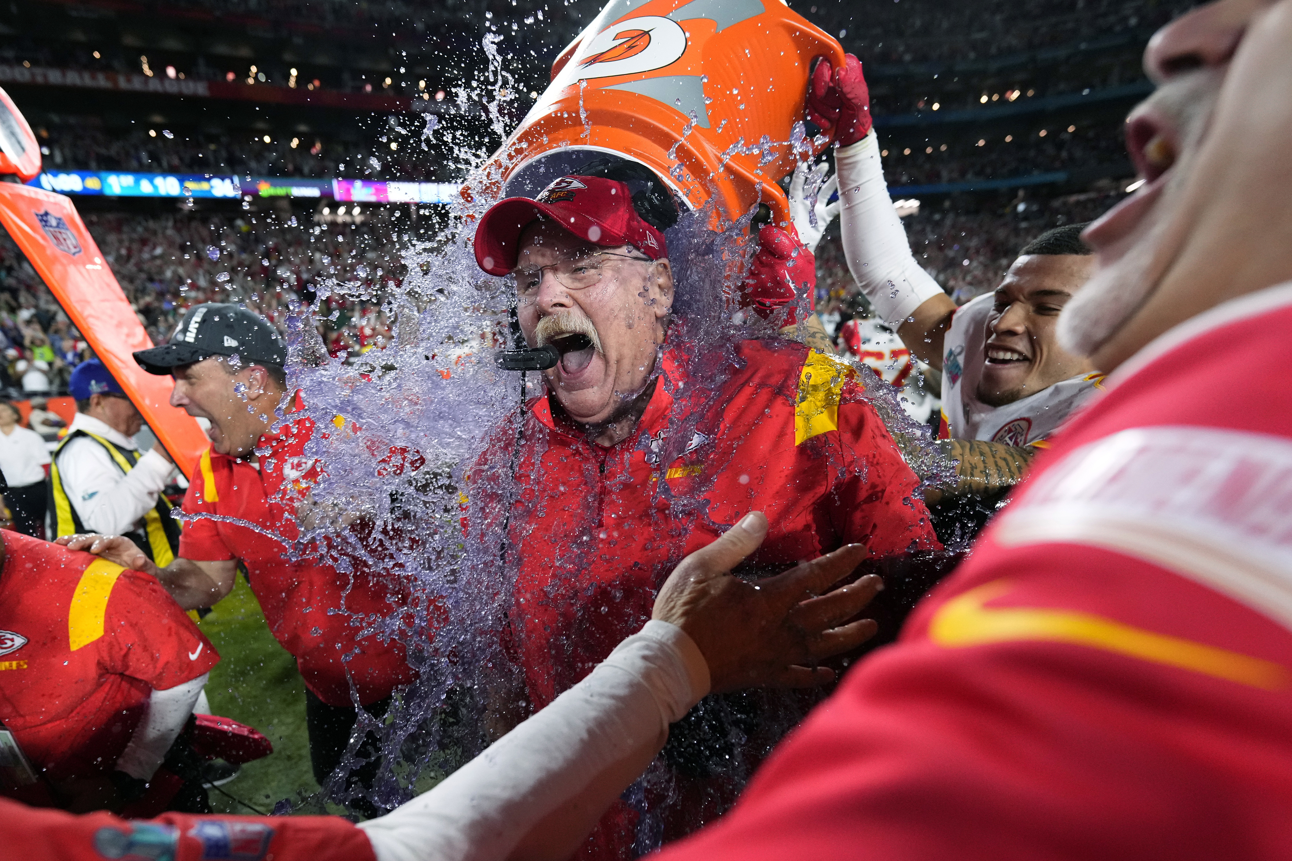 FILE_ Kansas City Chiefs head coach Andy Reid is doused after their win against the Philadelphia Eagles at the NFL Super Bowl 57 football game, Sunday, Feb. 12, 2023, in Glendale, Ariz. 