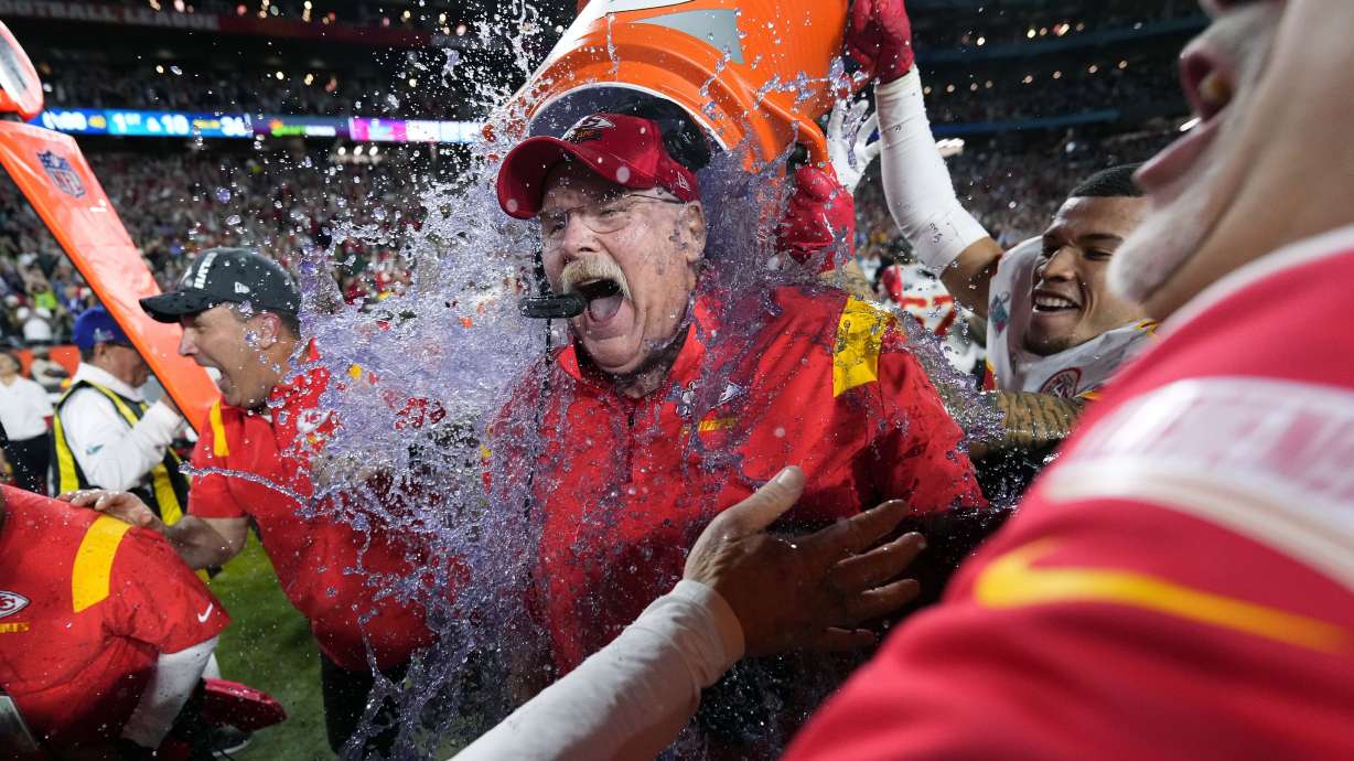 FILE_ Kansas City Chiefs head coach Andy Reid is doused after their win against the Philadelphia Eagles at the NFL Super Bowl 57 football game, Sunday, Feb. 12, 2023, in Glendale, Ariz.