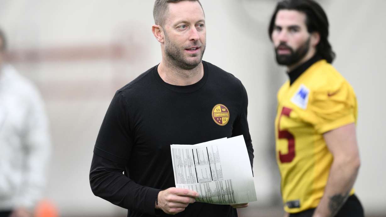 Washington Commanders offensive coordinator Kliff Kingsbury watches during NFL football practice, Friday, Jan. 24, 2025, in Ashburn, Va.