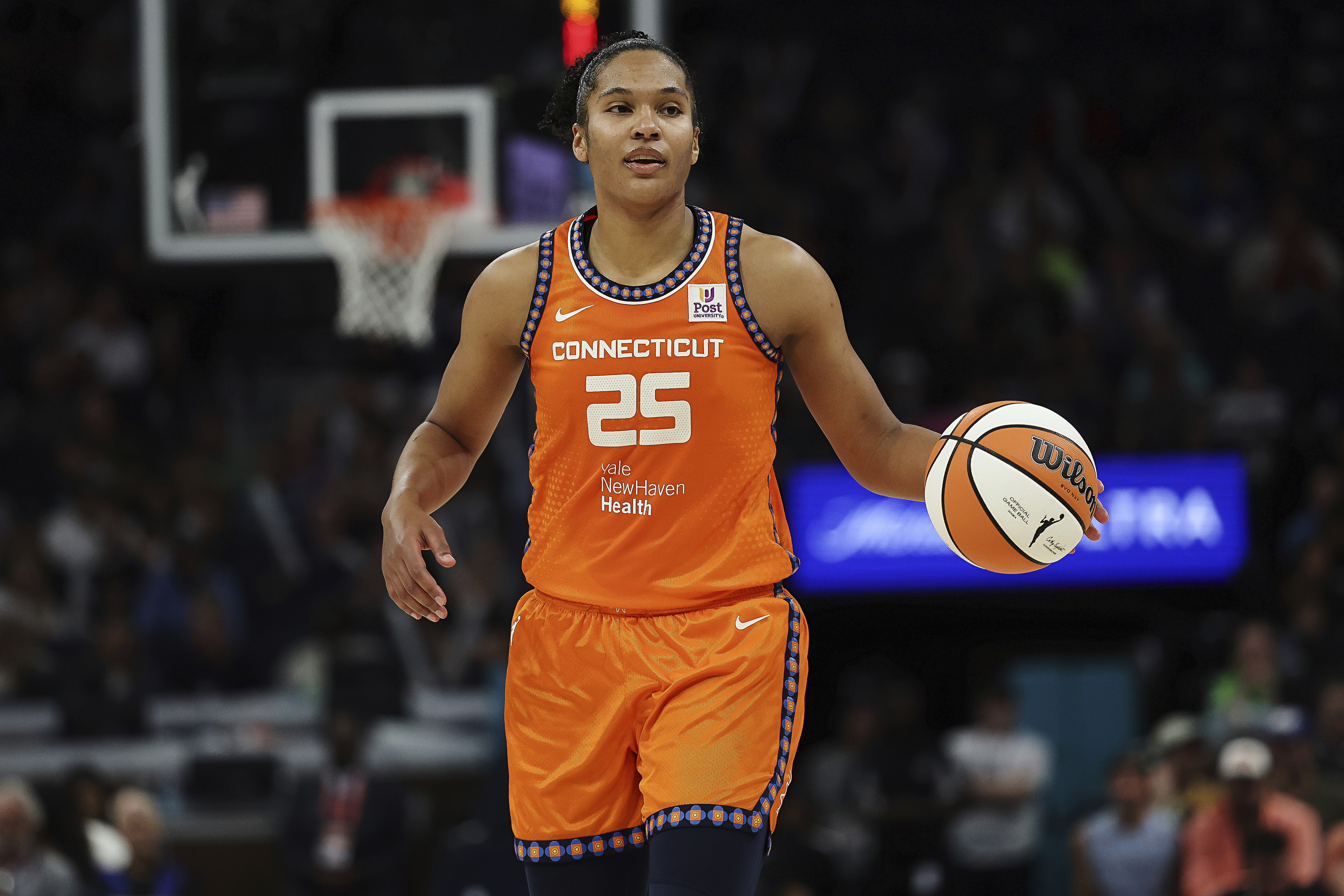 FILE - Connecticut Sun forward Alyssa Thomas (25) handles the ball during the second half of Game 1 of a WNBA basketball semifinals series against the Minnesota Lynx, Sept. 29, 2024, in Minneapolis. 