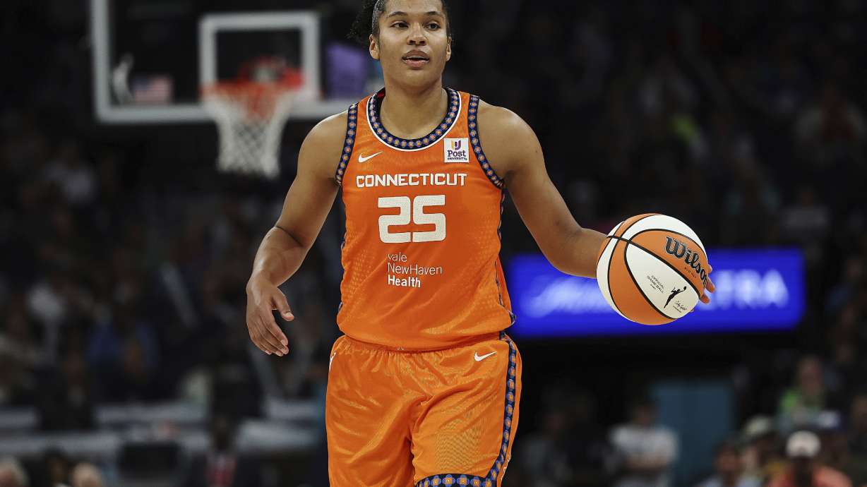 FILE - Connecticut Sun forward Alyssa Thomas (25) handles the ball during the second half of Game 1 of a WNBA basketball semifinals series against the Minnesota Lynx, Sept. 29, 2024, in Minneapolis.