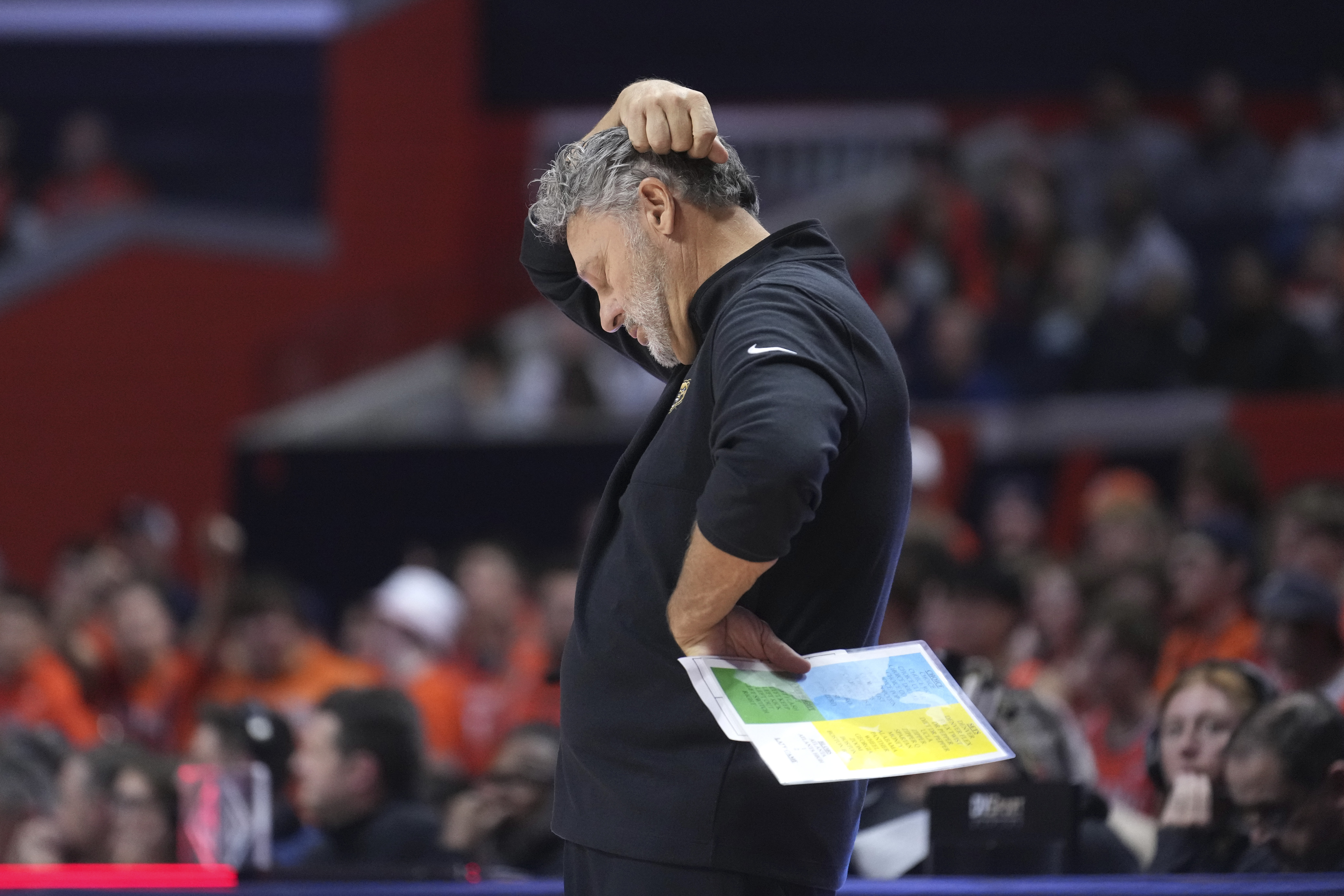 FILE - Oakland head coach Greg Kampe reacts during the second half of an NCAA college basketball game against Illinois, Nov. 13, 2024, in Champaign, Ill. 