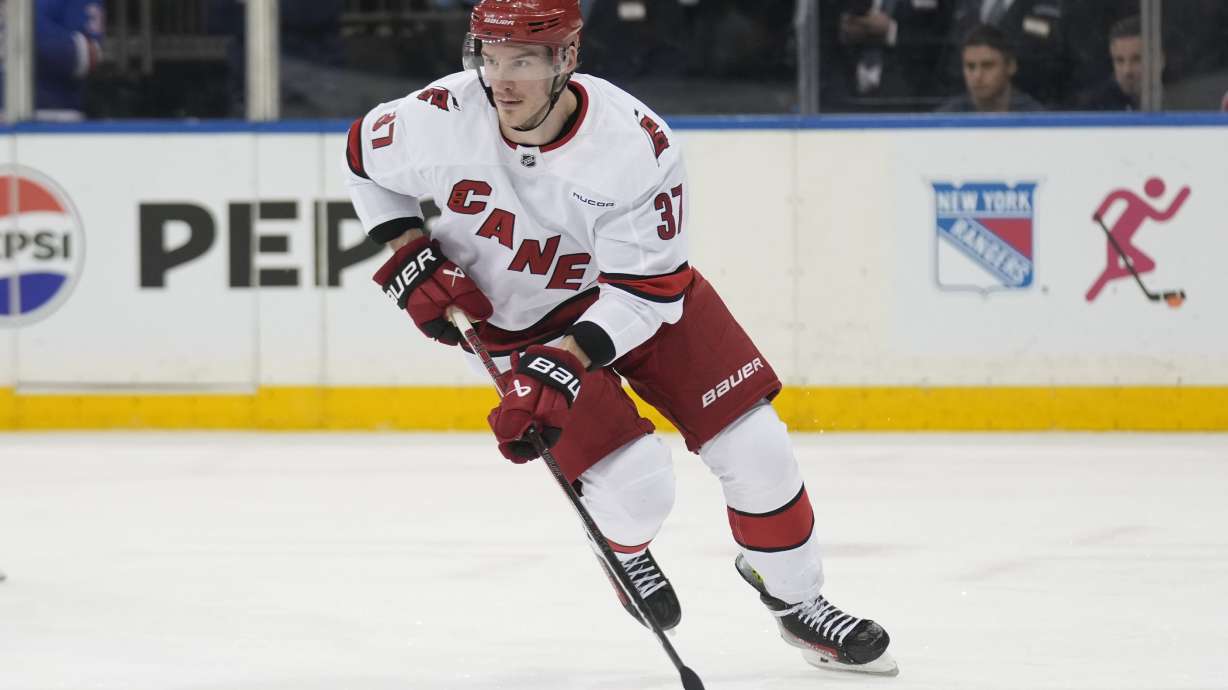 Carolina Hurricanes' Andrei Svechnikov moves the puck up the ice during the second period of an NHL hockey game against the New York Rangers, Tuesday, Jan. 28, 2025, in New York.