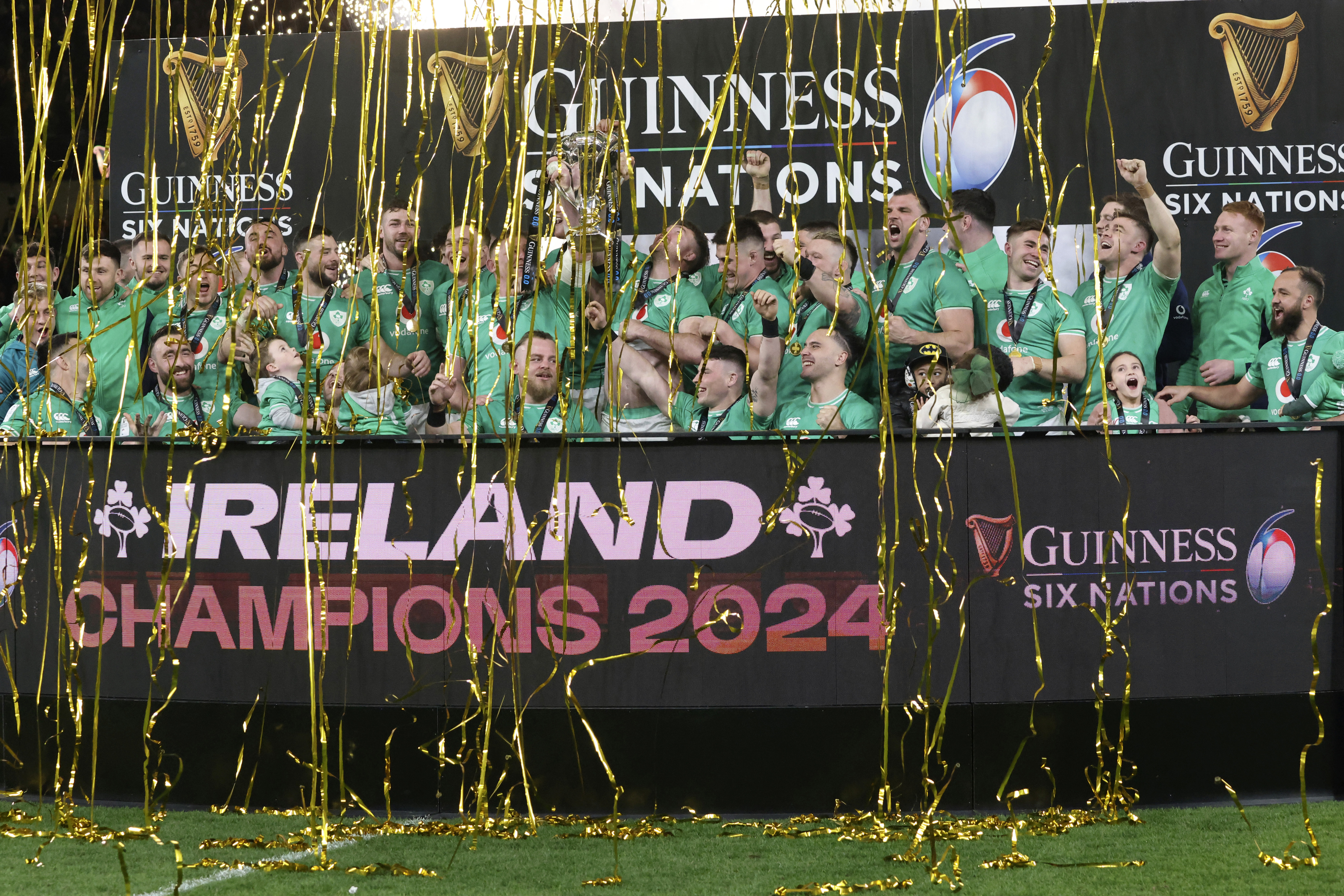 FILE - Ireland's Peter O'Mahony, centre right, and Tadgh Furlong, centre left, lift the Six Nations trophy after defeating Scotland in their rugby union international match at the Aviva stadium in Dublin, Ireland, March 16, 2024.