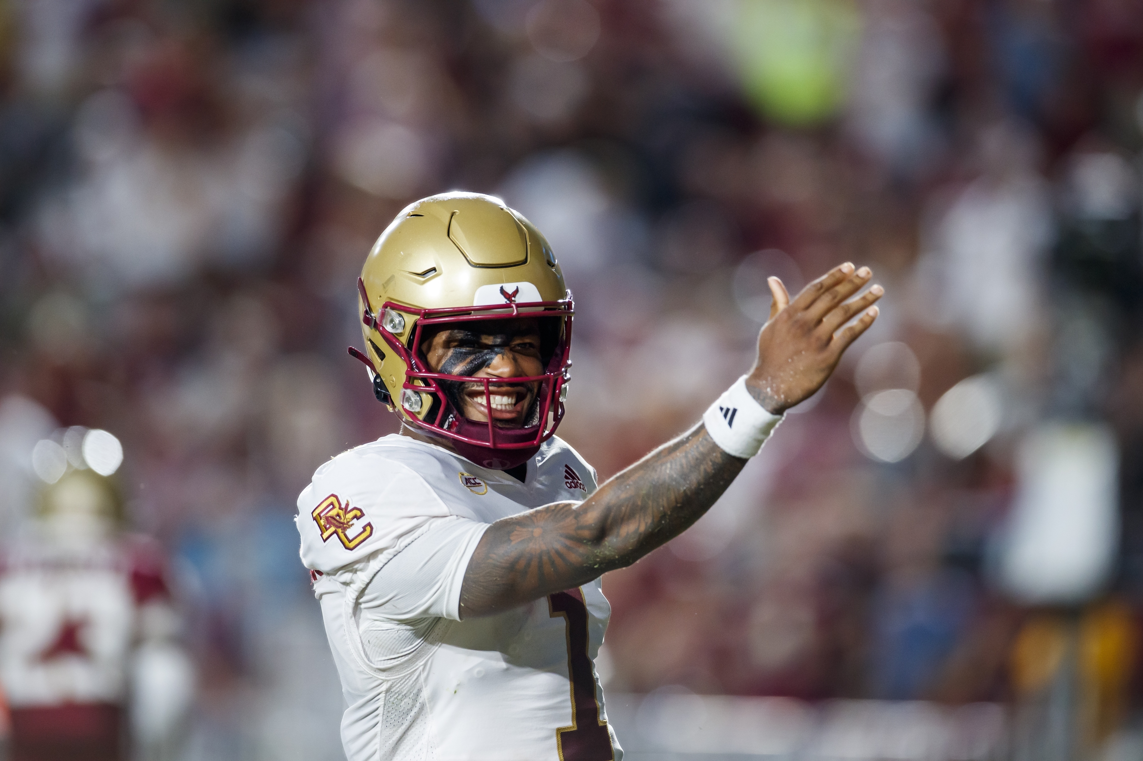 FILE - Boston College quarterback Thomas Castellanos celebrates by making a chopping motion with his hand towards Florida State fans after he scored the first touchdown during the first half of an NCAA college football game, Monday, Sept. 2, 2024, in Tallahassee, Fla. 