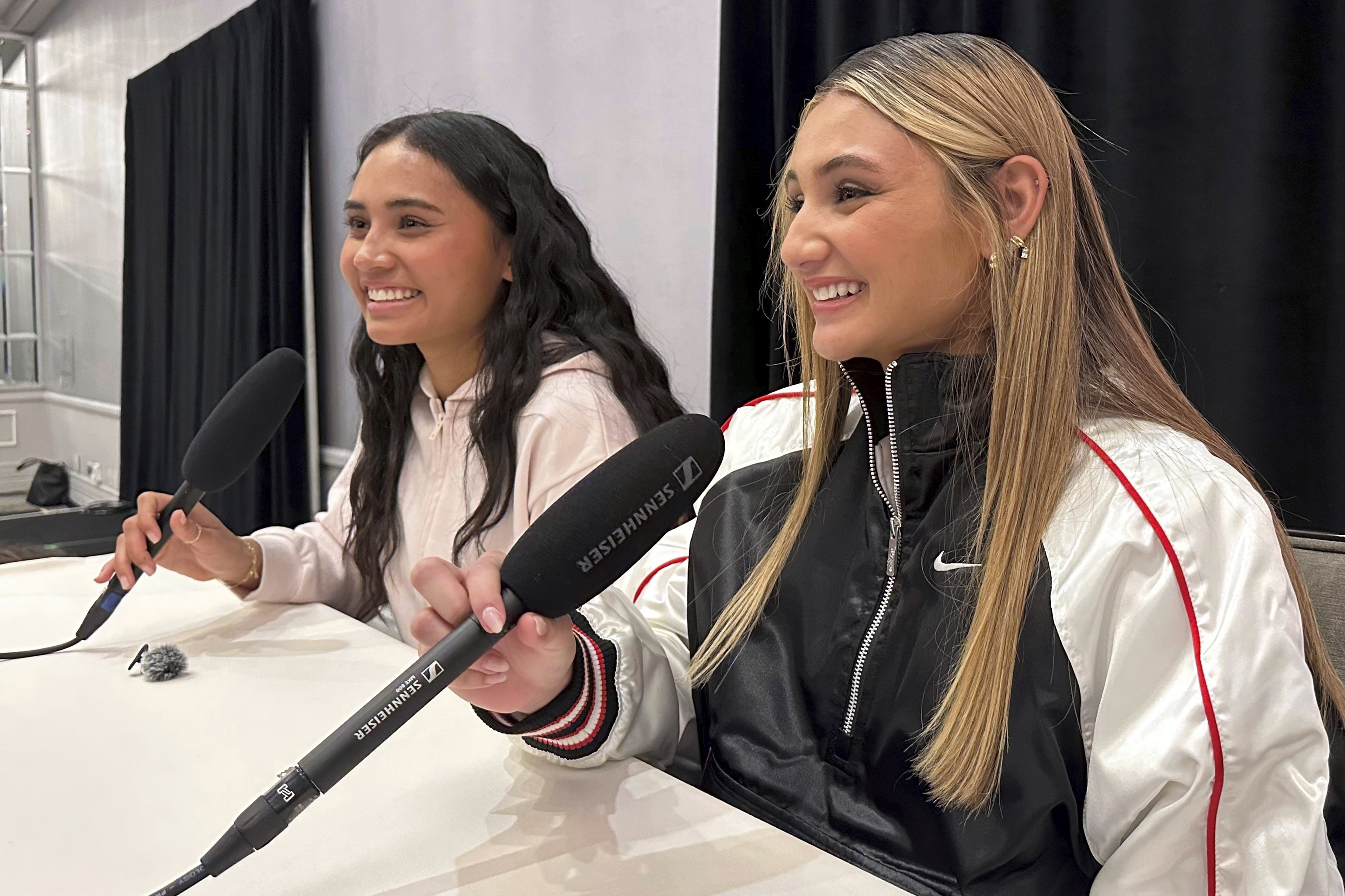 Alyssa Thompson, left, and her younger sister Gisele Thompson (right) speak to the media at the National Women’s Soccer League Media Day at the Beverly Hilton in Beverly Hills, Calif., Friday, Jan. 24, 2025. 