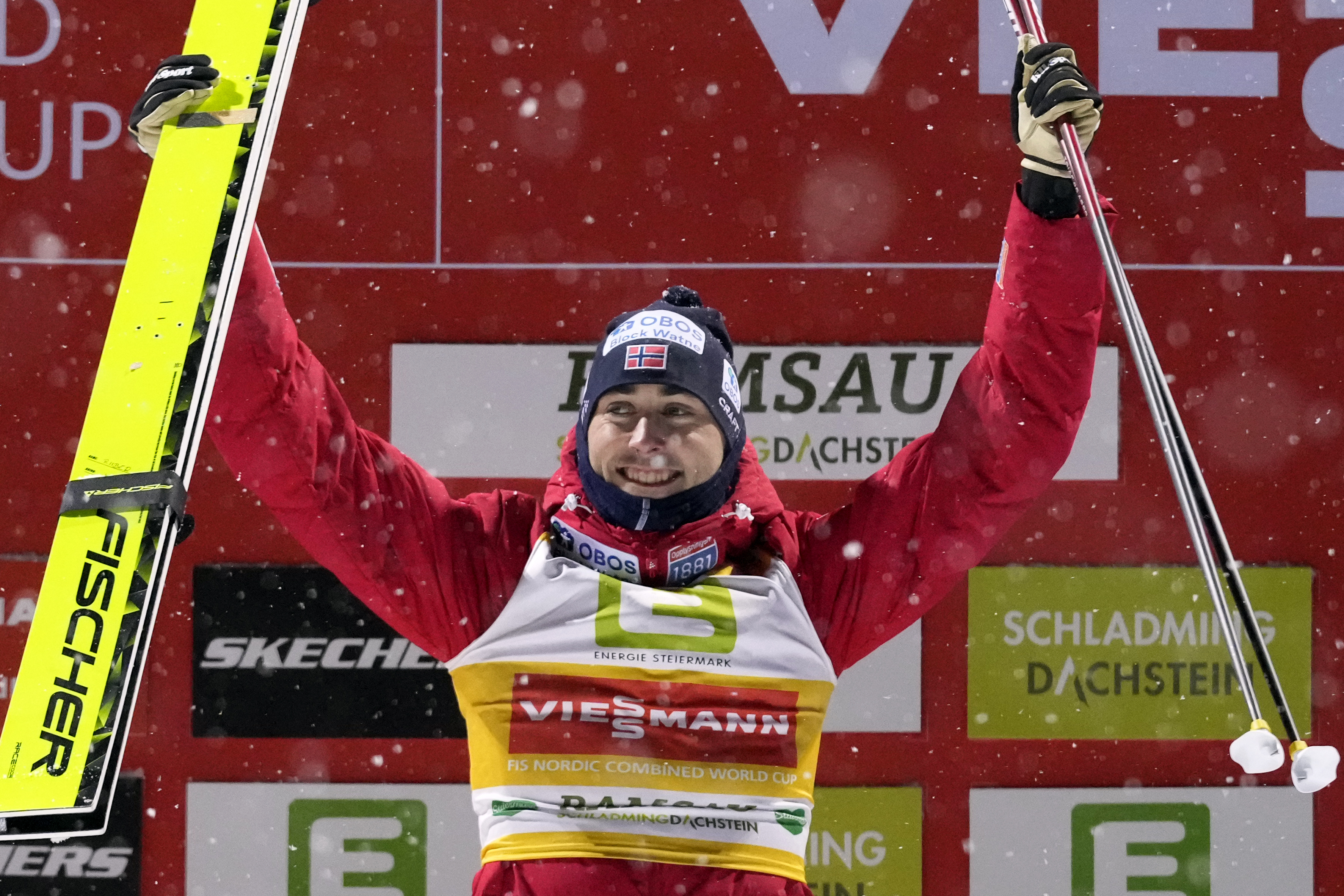 FILE - Jarl Magnus Riiber, of Norway, celebrates on the podium after winning the men's Individual Mass Start Normal Hill HS98/10Km event, at the Nordic Combined World Cup in Ramsau am Dachstein, Austria, Dec. 20, 2024.