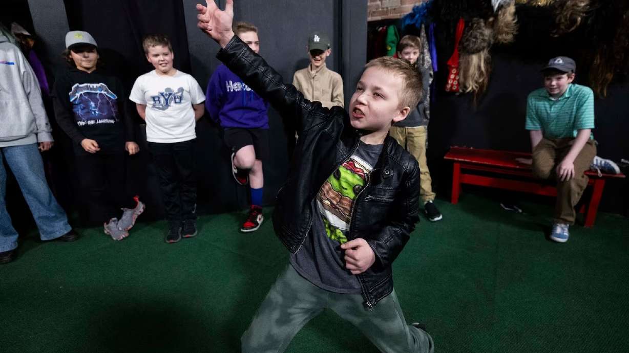 Rowan Butcher acts out a performance during an Improv Academy Class for homeschooled children at ComedySportz Utah in Provo on Tuesday.