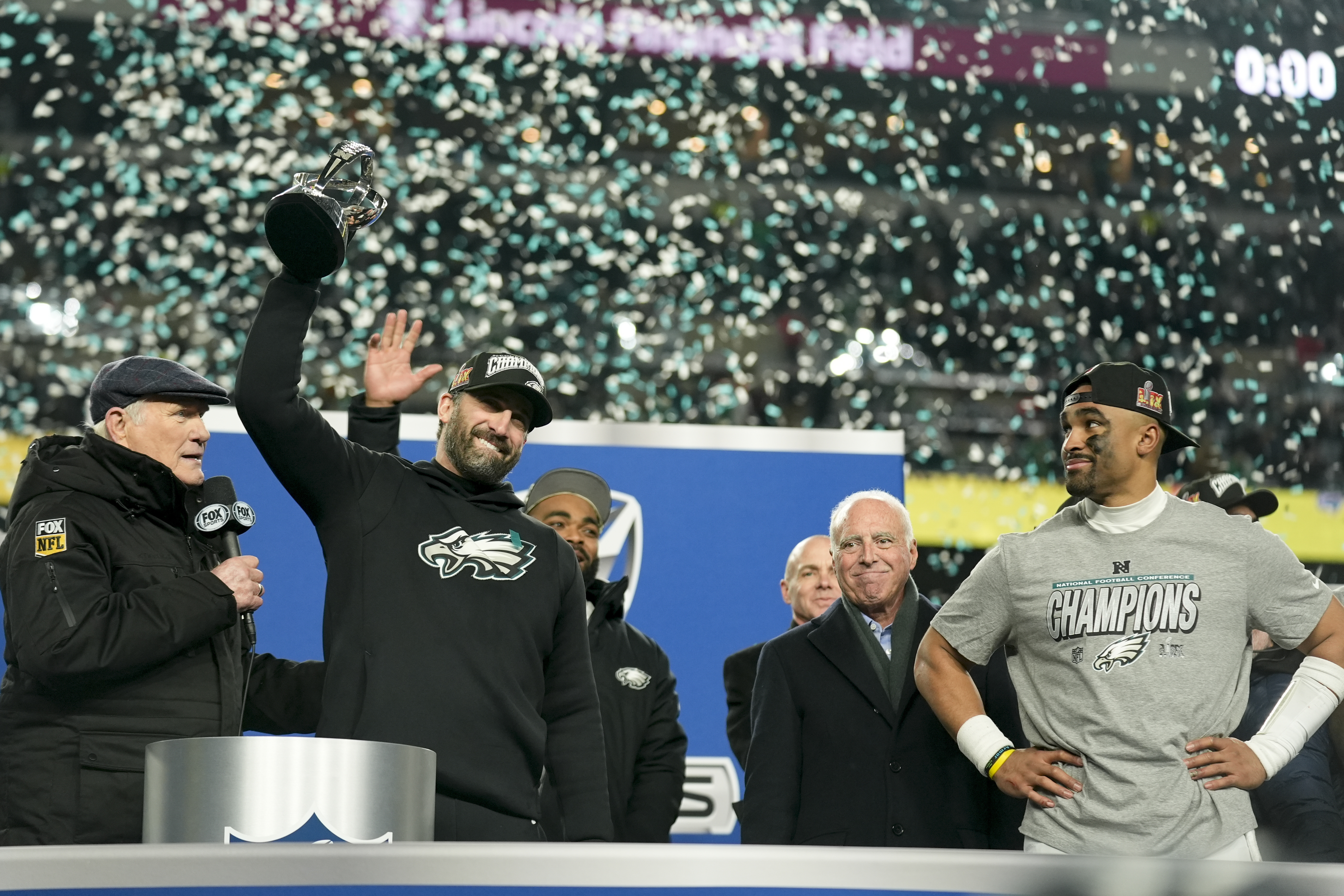 Philadelphia Eagles head coach Nick Sirianni celebrates with the trophy after their win against the Washington Commanders in the NFC Championship NFL football game, Sunday, Jan. 26, 2025, in Philadelphia.
