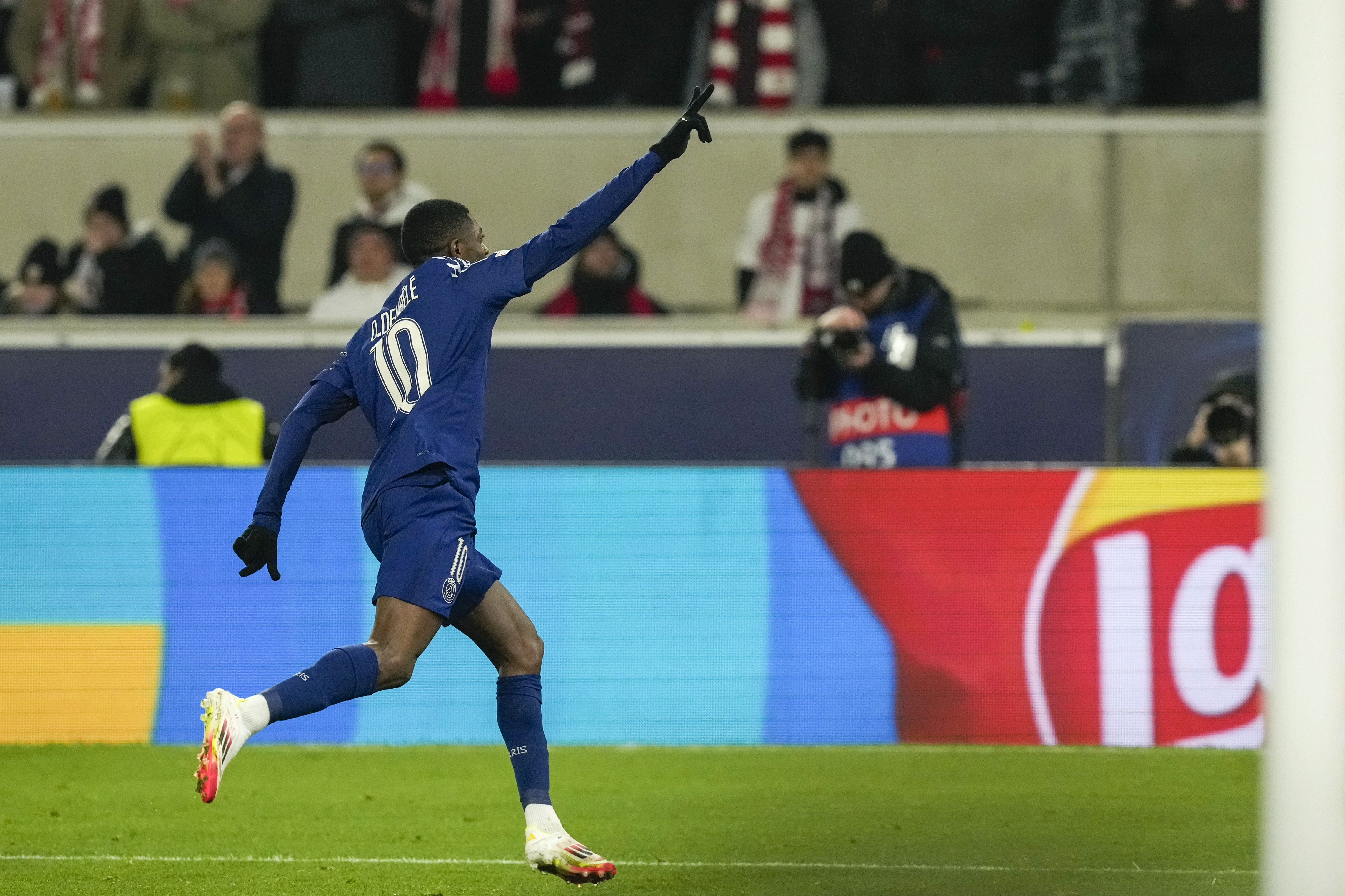 PSG's Ousmane Dembele celebrates after scoring his side's fourth goal during the Champions League opening phase soccer match between Stuttgart and Paris Saint-Germain at the Stuttgart Arena in Stuttgart, Germany, Wednesday, Jan. 29, 2025.