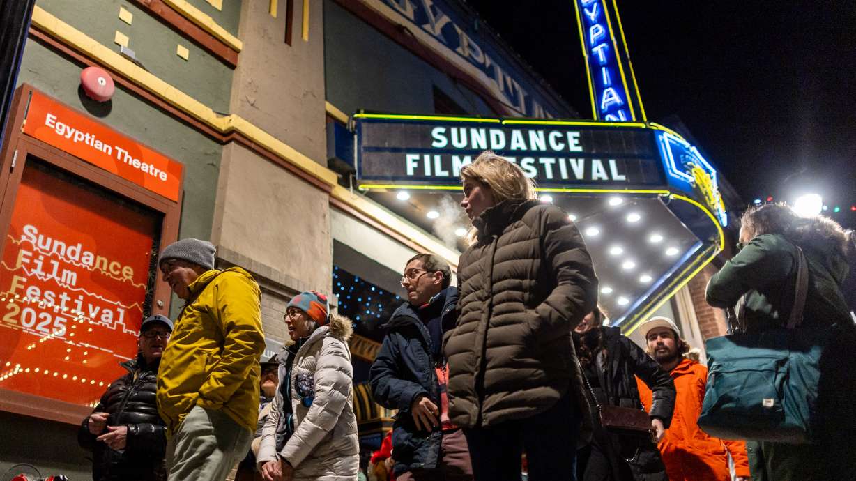 People exit the Egyptian Theatre during the Sundance Film Festival in Park City on Jan. 24. Following a yearlong evaluation process, the Sundance Institute announced Thursday the film festival will be leaving Utah, its home for over 40 years.