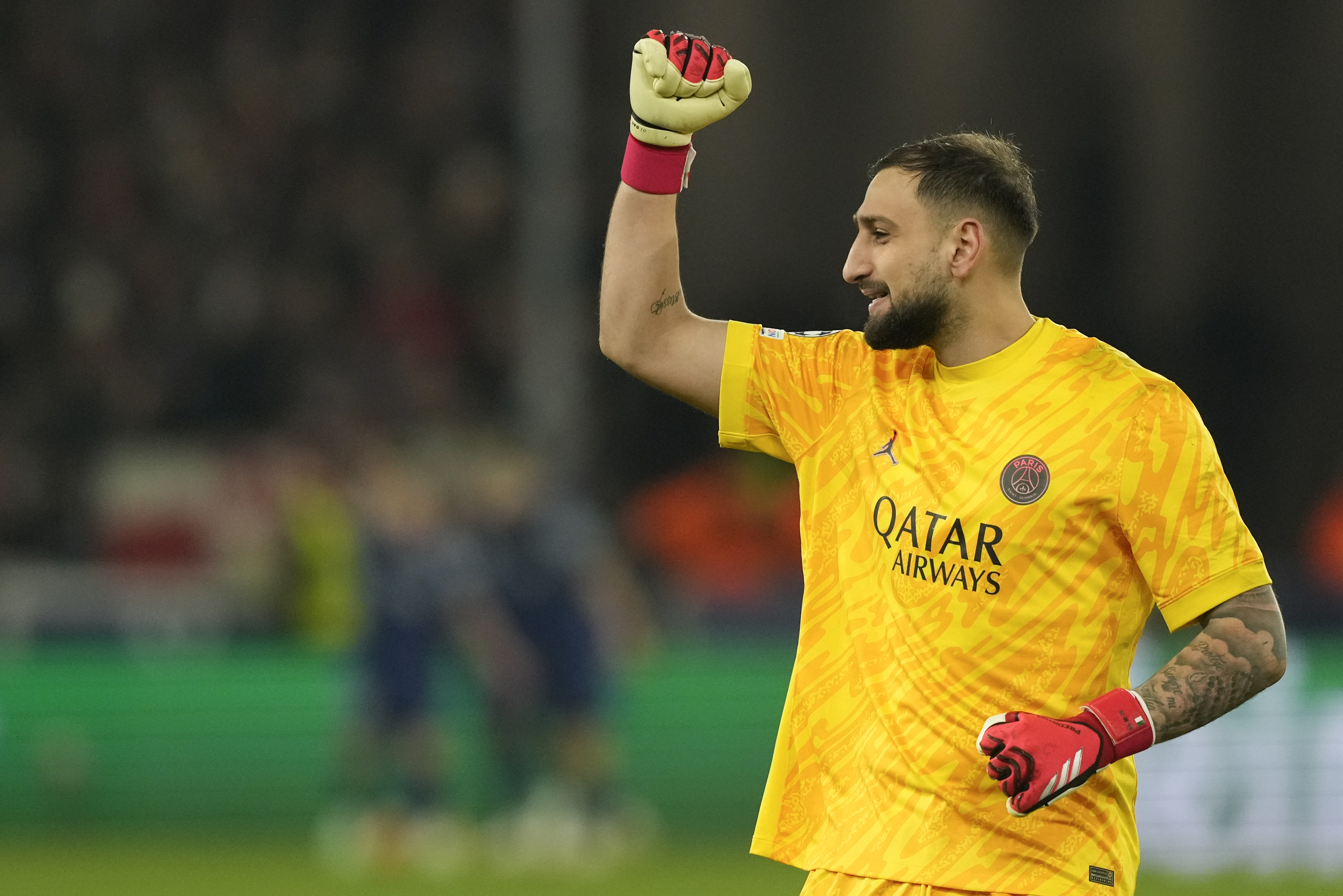 PSG's goalkeeper Gianluigi Donnarumma celebrates after PSG's Ousmane Dembele scoring his side's third goal during the Champions League opening phase soccer match between Stuttgart and Paris Saint-Germain at the Stuttgart Arena in Stuttgart, Germany, Wednesday, Jan. 29, 2025. 