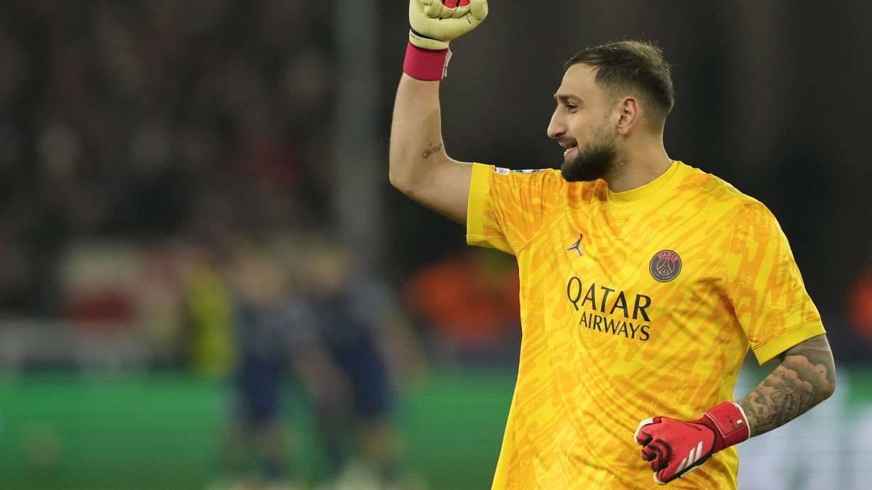 PSG's goalkeeper Gianluigi Donnarumma celebrates after PSG's Ousmane Dembele scoring his side's third goal during the Champions League opening phase soccer match between Stuttgart and Paris Saint-Germain at the Stuttgart Arena in Stuttgart, Germany, Wednesday, Jan. 29, 2025.