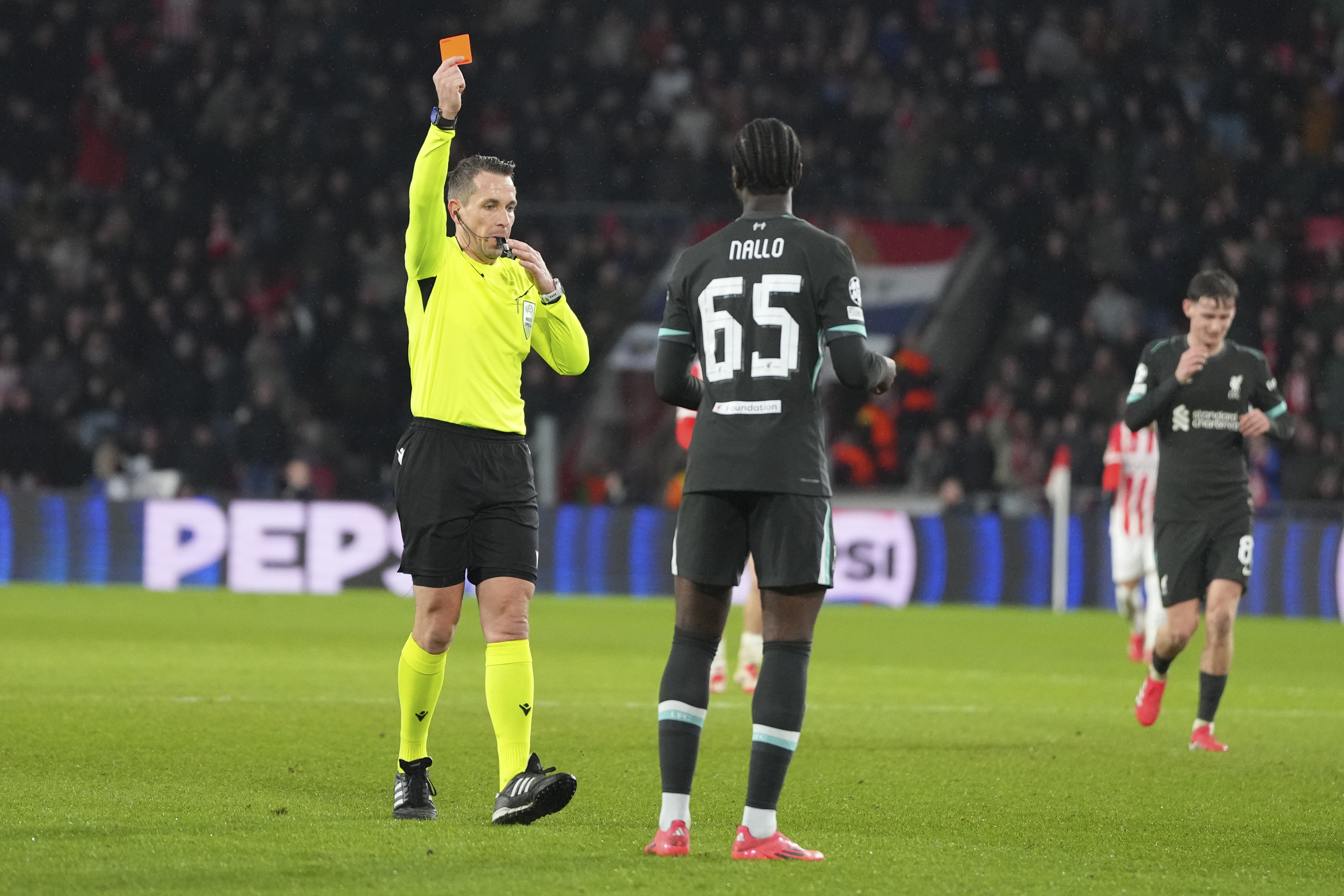 Liverpool's Amara Nallo receives a red card during the Champions League opening phase soccer match between PSV and Liverpool at Phillips Stadium in Eindhoven, Netherlands, Wednesday, Jan. 29, 2025. 