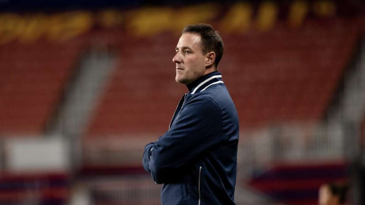 Utah Royals FC head coach Jimmy Coenraets looks on during a match at America First Field.