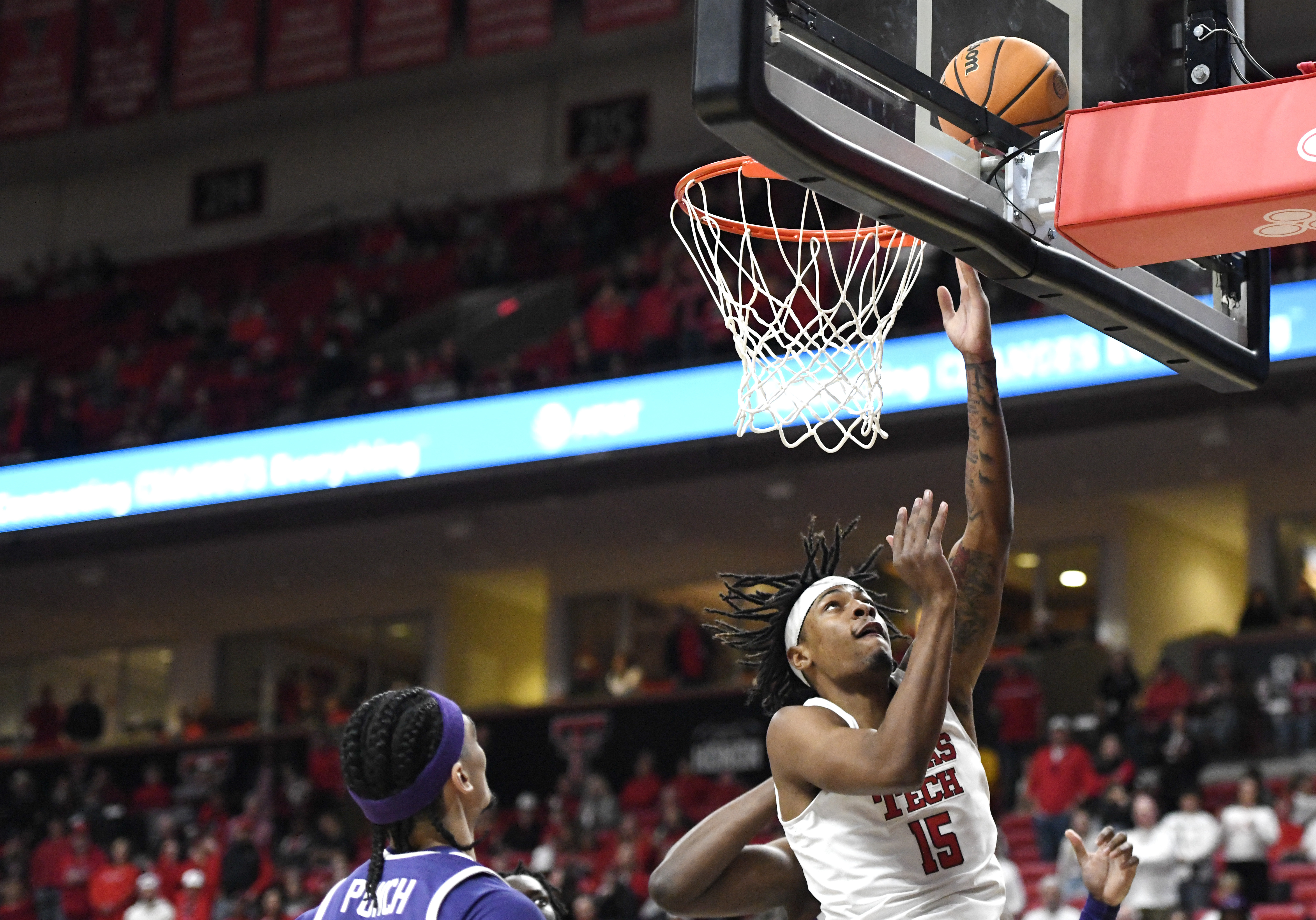 Texas Tech's forward JT Toppin (15) goes for a layup during the first half in an NCAA college basketball game against TCU, Wednesday, Jan. 29, 2025, in Lubbock, Texas. 