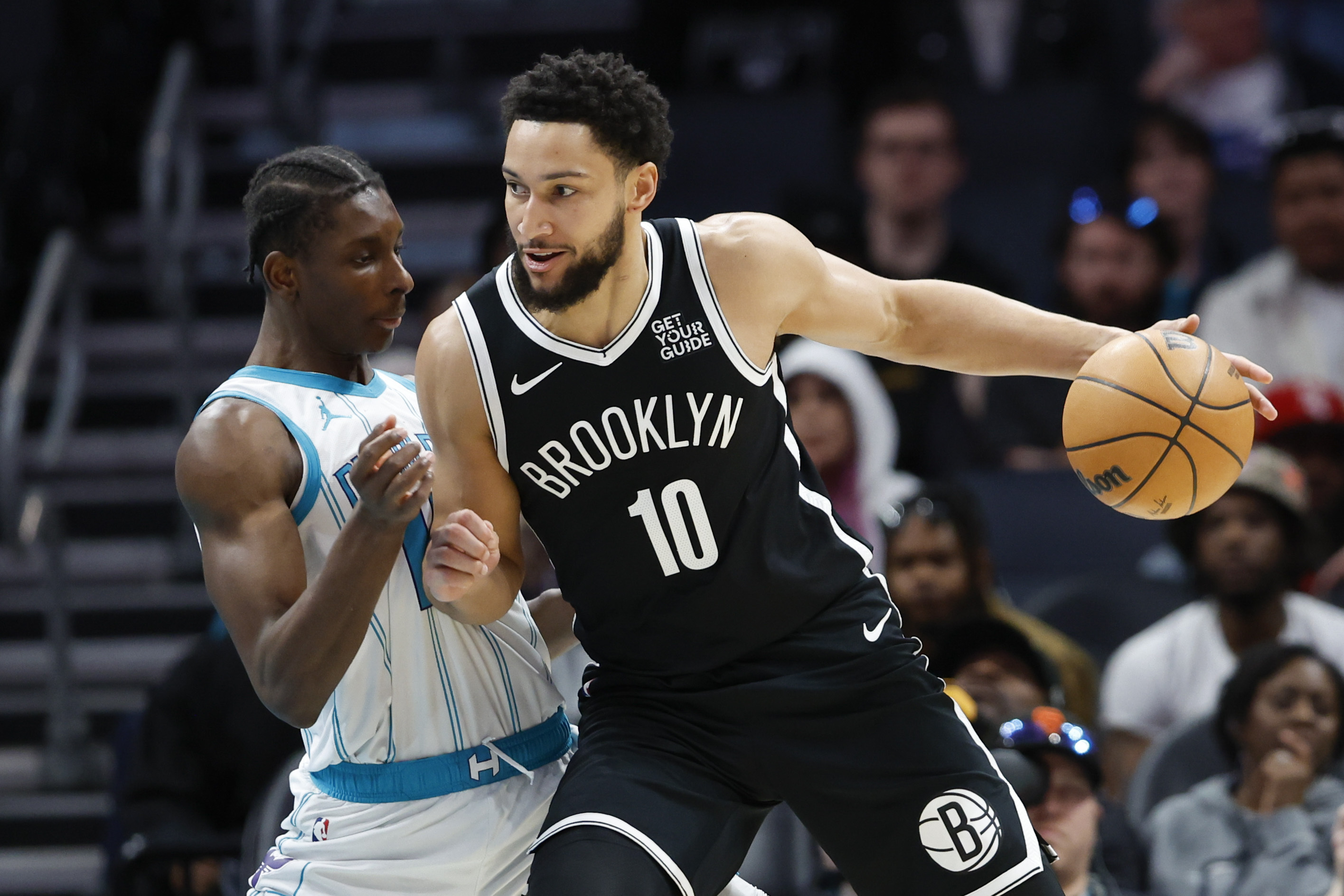 Brooklyn Nets guard Ben Simmons (10) drives into Charlotte Hornets forward Moussa Diabate during the first half of an NBA basketball game in Charlotte, N.C., Wednesday, Jan. 29, 2025.