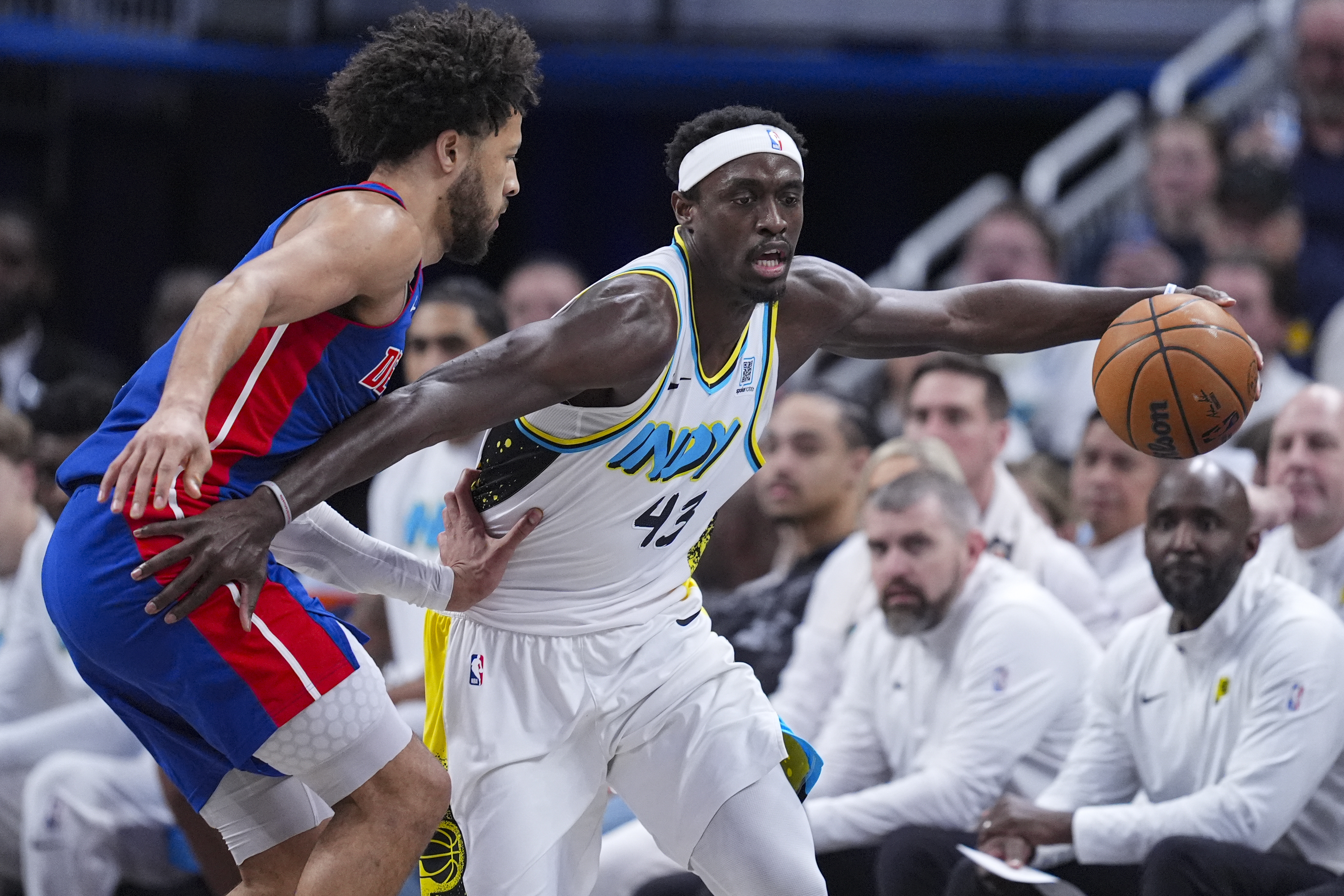 Detroit Pistons guard Cade Cunningham (2) defends Indiana Pacers forward Pascal Siakam (43) during the first half of an NBA basketball game in Indianapolis, Wednesday, Jan. 29, 2025. 