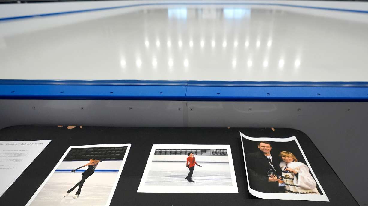 Photographs of aircraft crash victims from The Skating Club of Boston are displayed, Jan. 30 in Norwood, Mass. From left is skater Jinna Han, skater Spencer Lane and coaches Vadim Naumov and Evgenia Shishkova. U.S. figure skaters were onboard a flight involved in midair collision in Arlington, Va. Wednesday.