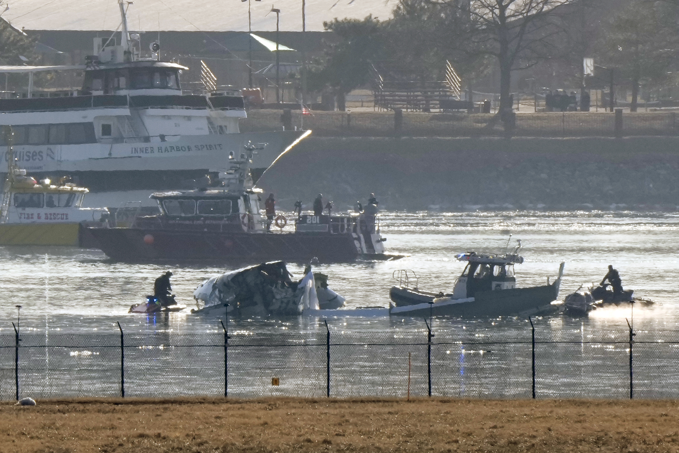 Search and rescue efforts are seen around a wreckage site in the Potomac River from Ronald Reagan Washington National Airport, early Thursday morning, Jan. 30, 2025, in Arlington, Va. 