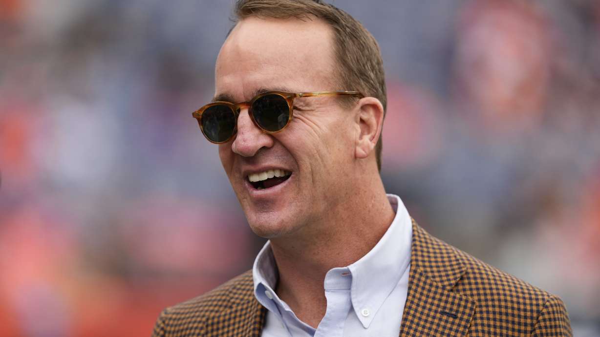 Hall of Fame quarterback Peyton Manning looks on before an NFL football game between the Denver Broncos and the Carolina Panthers, Oct. 27, 2024, in Denver. Manning made a stop in Utah this week to speak at the 47G Zero Gravity Summit.