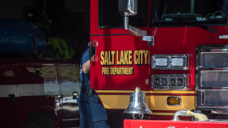 A Salt Lake fire captain who taught EMT classes at a community college has been charged with inappropriately touching two of his students.
