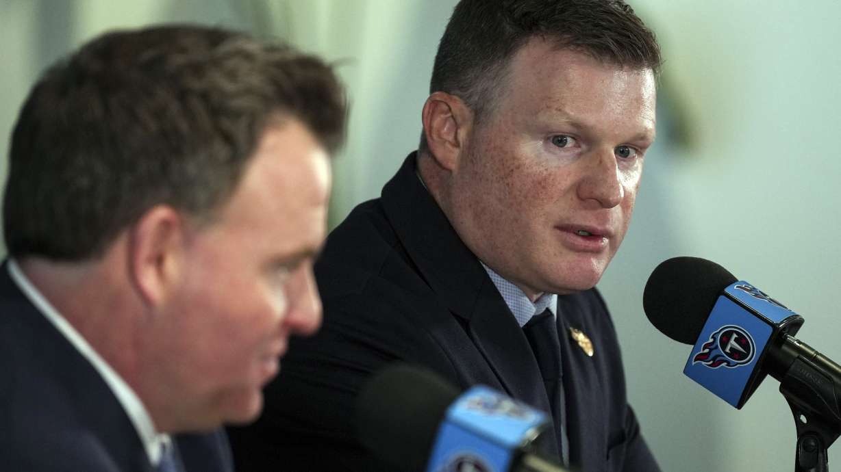 Tennessee Titans President of Football Operations Chad Brinker, right, speaks during a news conference with the team's new general manager Mike Borgonzi, left, at the NFL football team's training facility Wednesday, Jan. 22, 2025, in Nashville, Tenn.