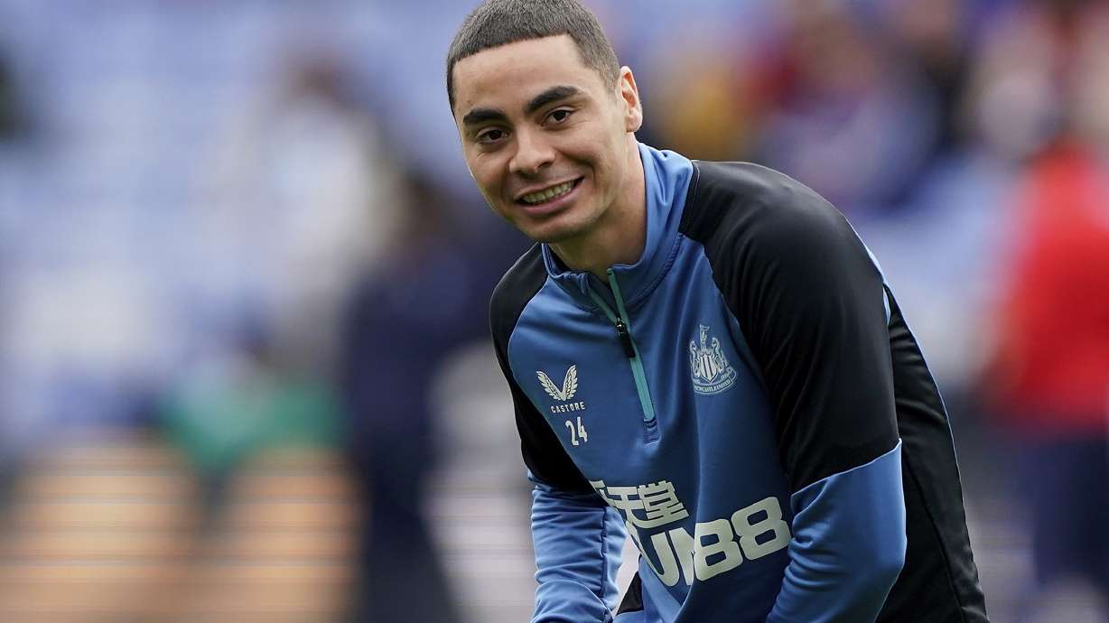FILE - Newcastle United's Miguel Almiron warms up before the English Premier League soccer match against Crystal Palace at Selhurst Park in London, Oct. 23, 2021.