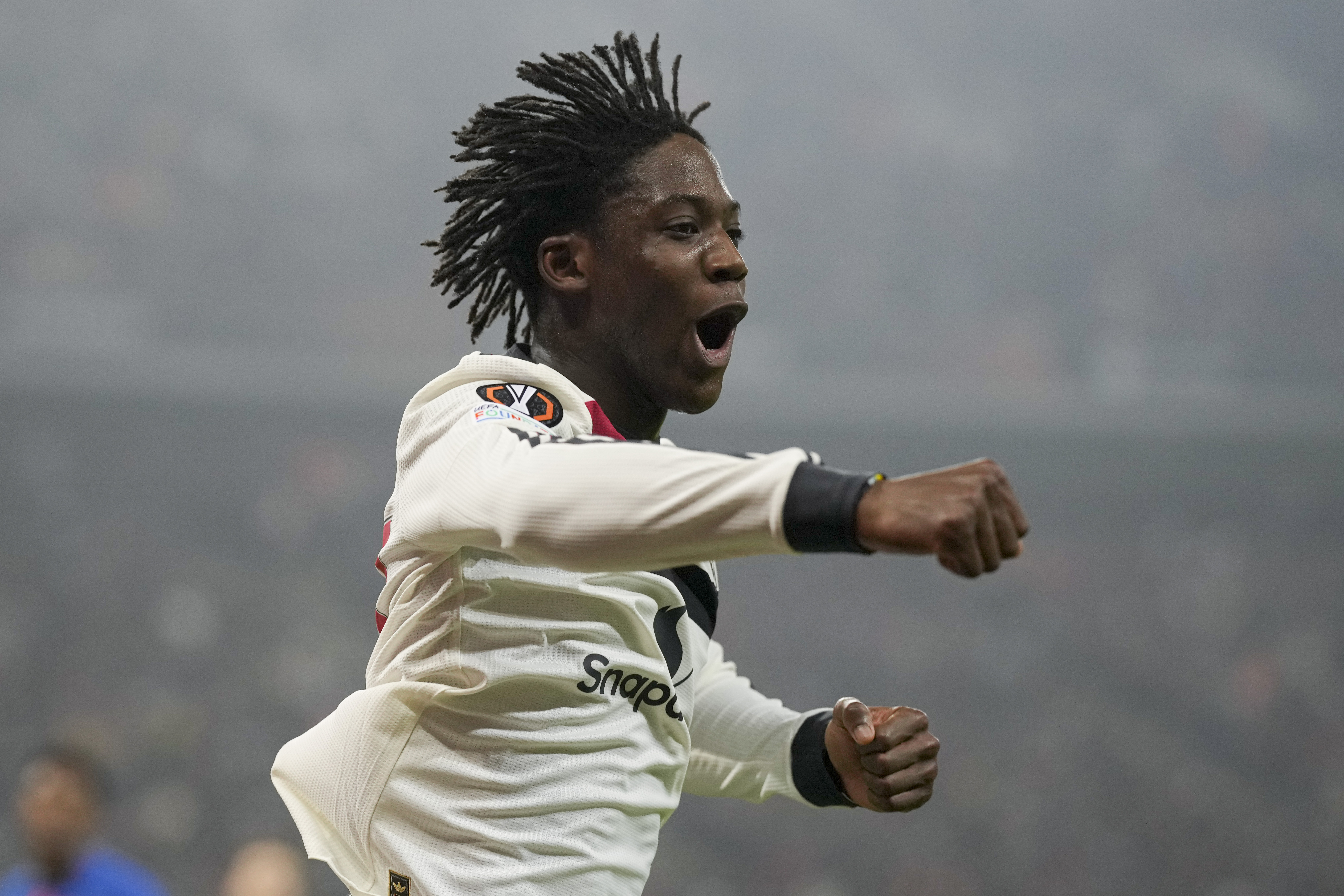 Manchester United's Kobbie Mainoo celebrates after scoring his side's second goal during the Europa League league phase soccer match between FCSB and Manchester United at the National Arena stadium, Thursday, Jan. 30, 2025. 