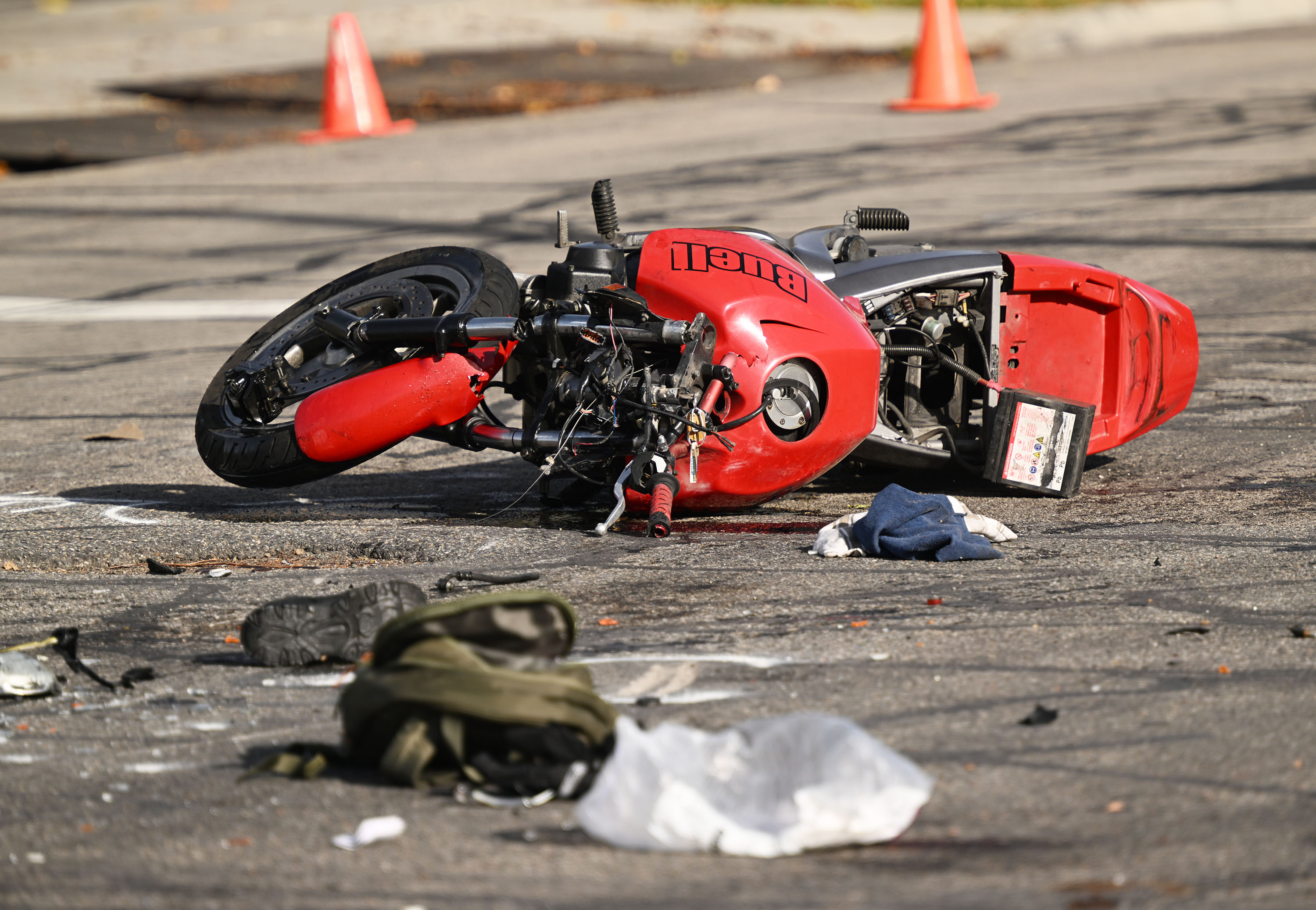 Police investigate a fatal motorcycle accident in South Salt Lake on Nov. 13, 2024. A Utah committee advanced a pair of bills Wednesday that would increase penalties for certain behaviors after motorcycle deaths reached a 15-year high in 2024.