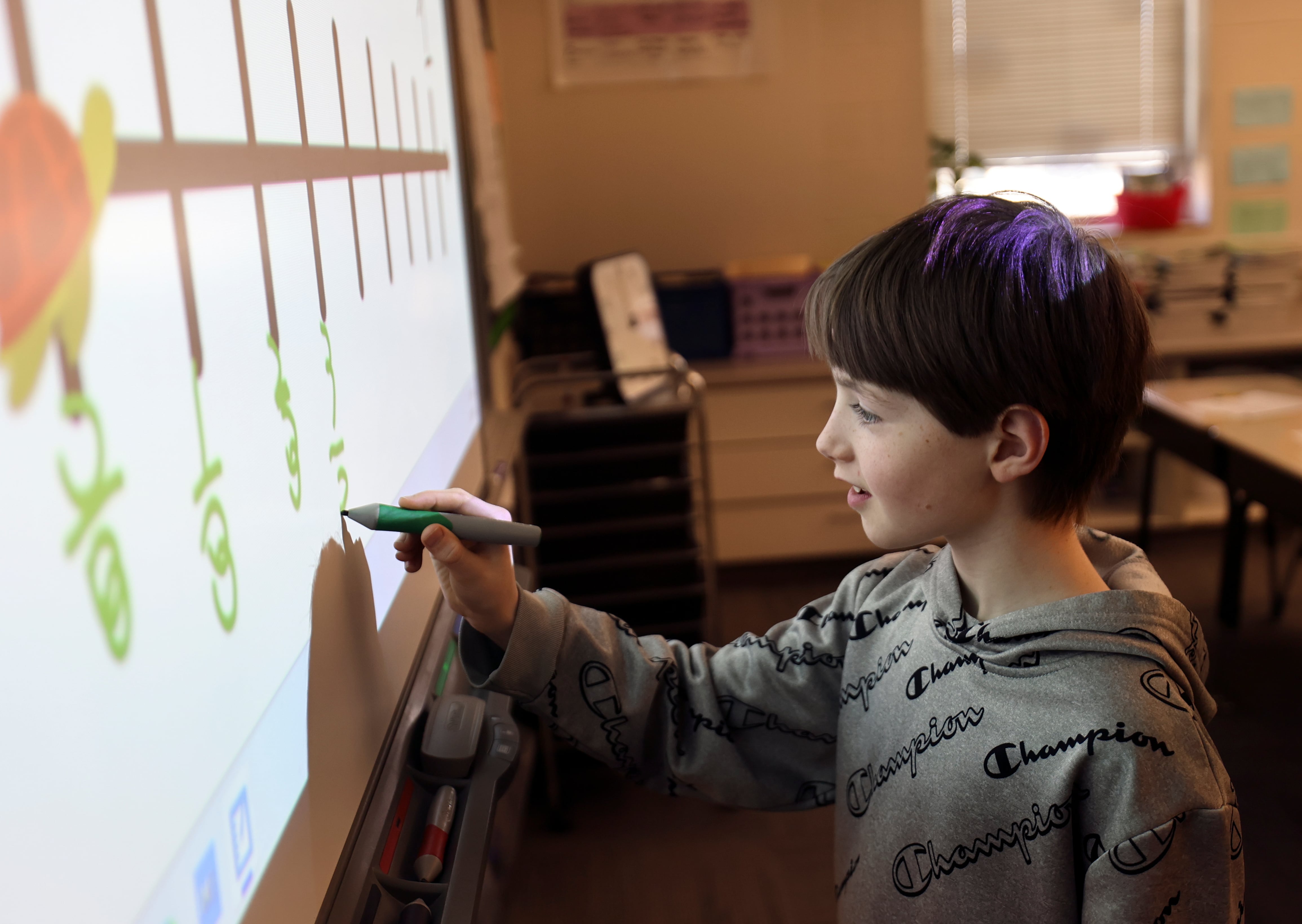 Celyn Billing works on fractions in Brianna Rolf’s fourth grade class at Whittier Elementary School in Salt Lake City on Thursday.