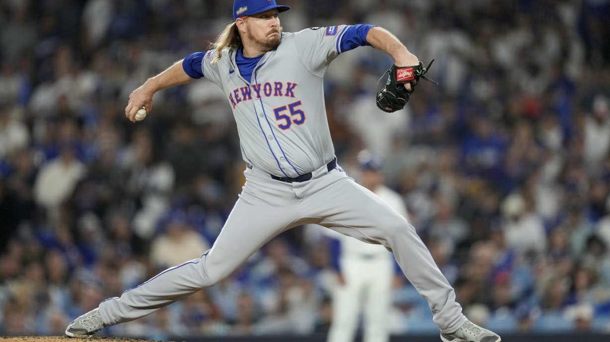 FILE - New York Mets pitcher Ryne Stanek throws against the Los Angeles Dodgers during the sixth inning in Game 6 of a baseball NL Championship Series, Oct. 20, 2024, in Los Angeles.