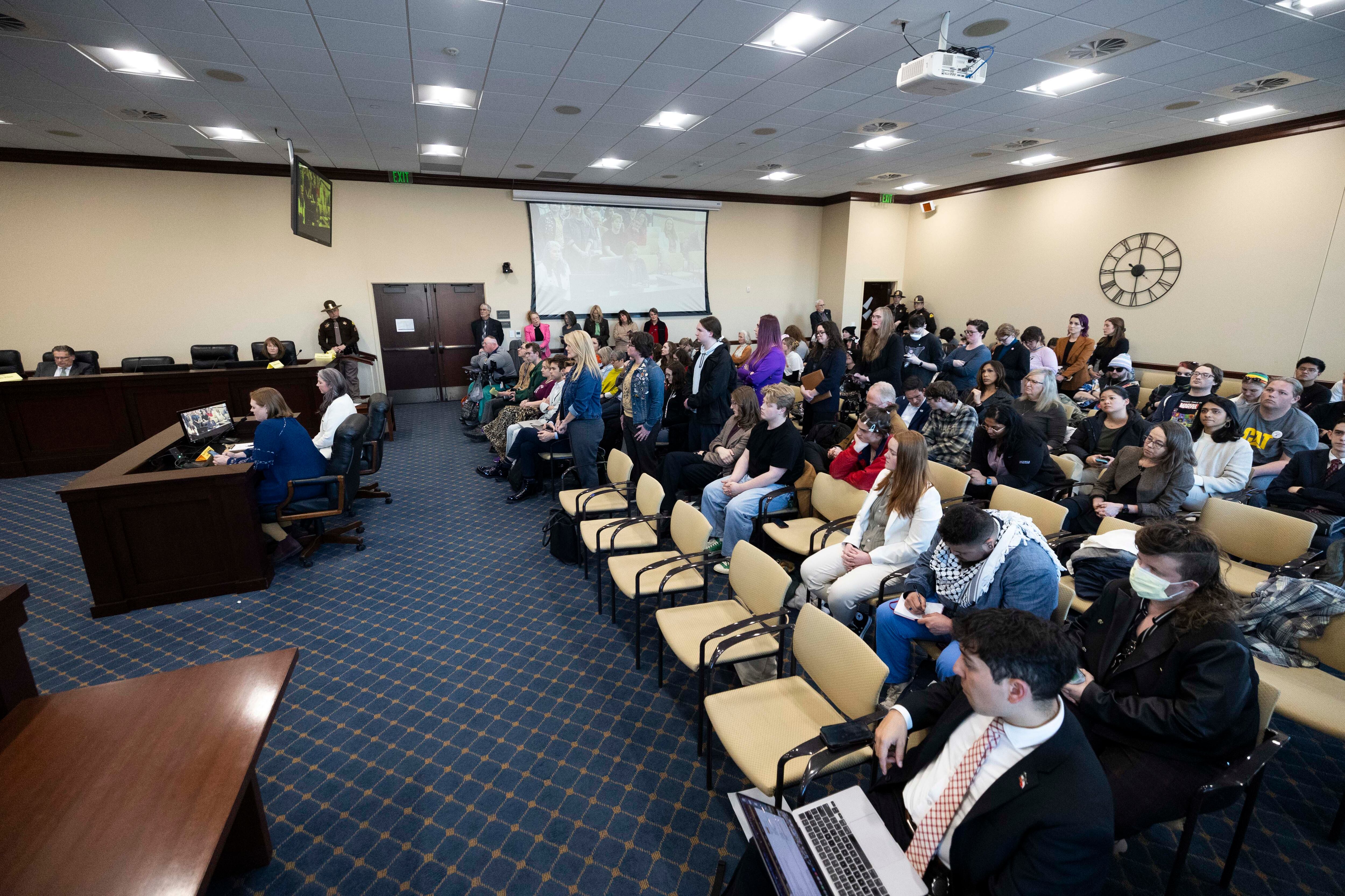 People line up to speak during the public comment period during a hearing on HB269, which pertains to privacy protections in sex-designated areas, in the Senate Education standing committee in Salt Lake City, Thursday.