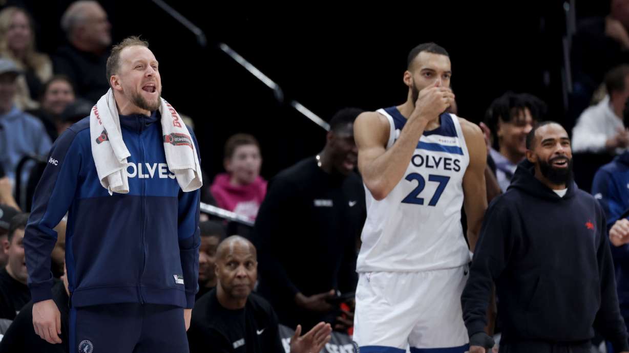 Former Utah Jazz players and current Minnesota Timberwolves players Joe Ingles, Rudy Gobert and Mike Conley cheer on the Timberwolves in the game against the Utah Jazz at the Delta Center in Salt Lake City on Thursday, Jan. 30, 2025.