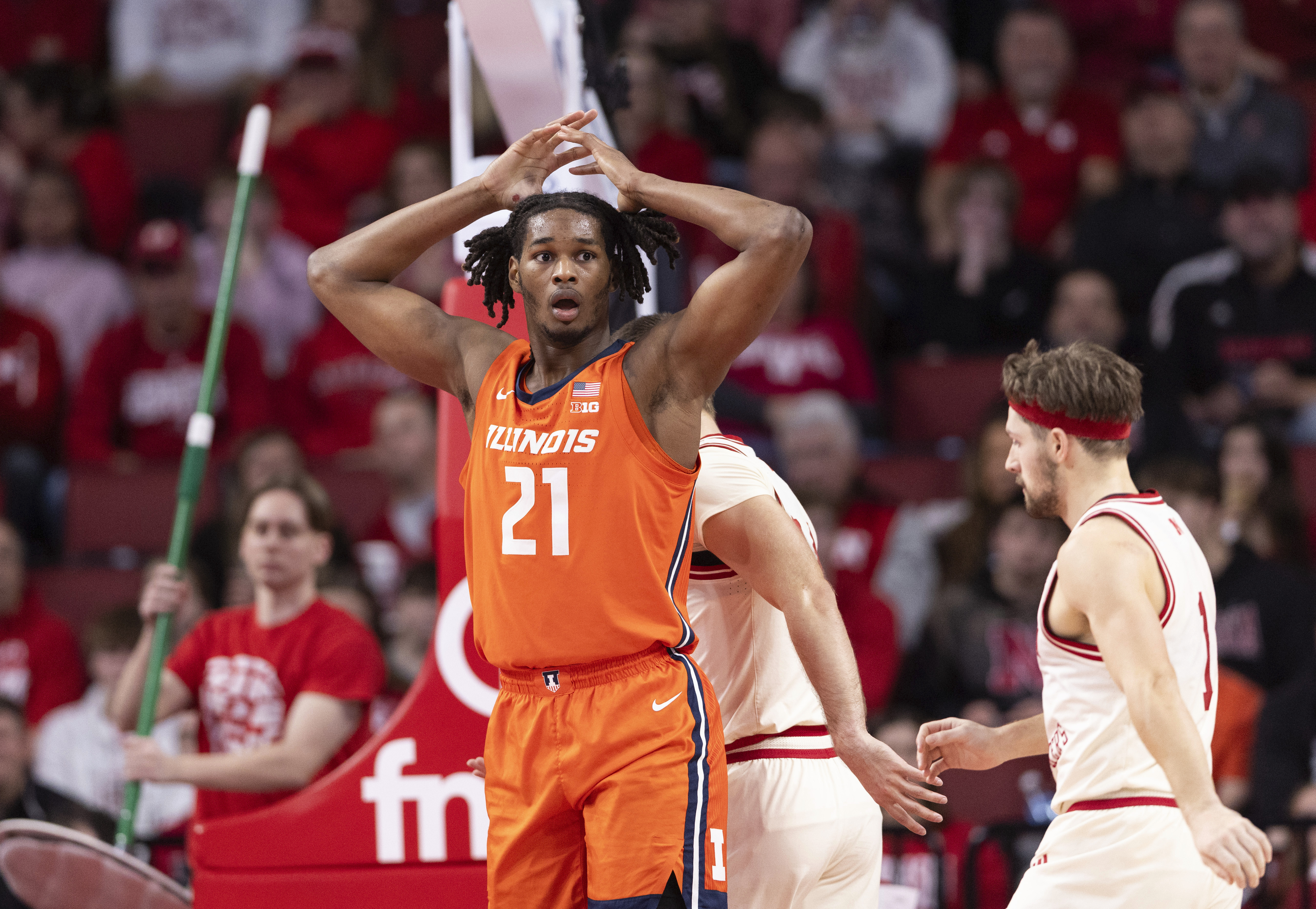 Illinois' Morez Johnson Jr. (21) reacts after he was called for a foul against Nebraska during the second half of an NCAA college basketball game Thursday, Jan. 30, 2025, in Lincoln, Neb.
