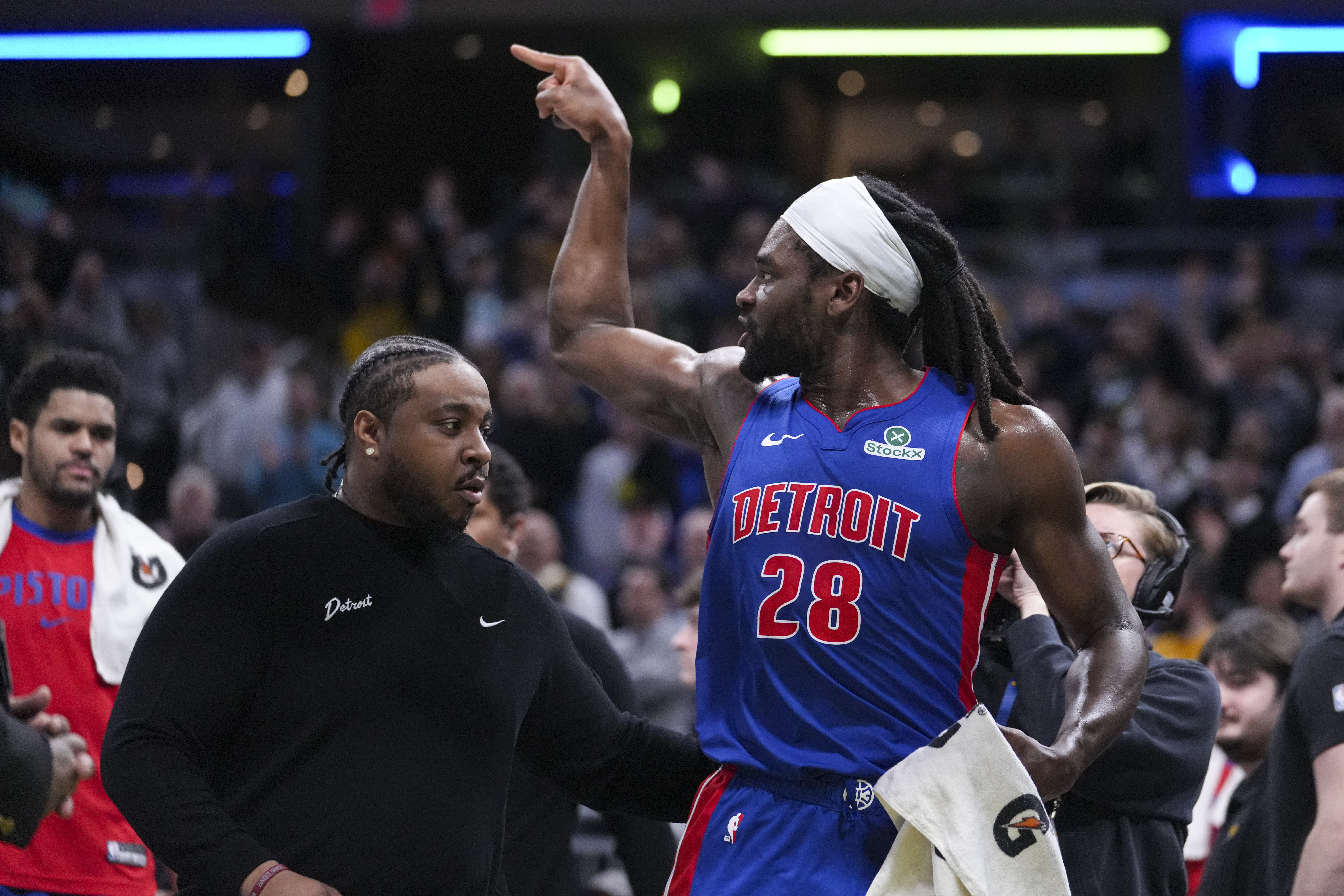 Detroit Pistons center Isaiah Stewart (28) gestures as he leaves the court following his ejection from the game during the first half of an NBA basketball game against the Indiana Pacers in Indianapolis, Wednesday, Jan. 29, 2025.