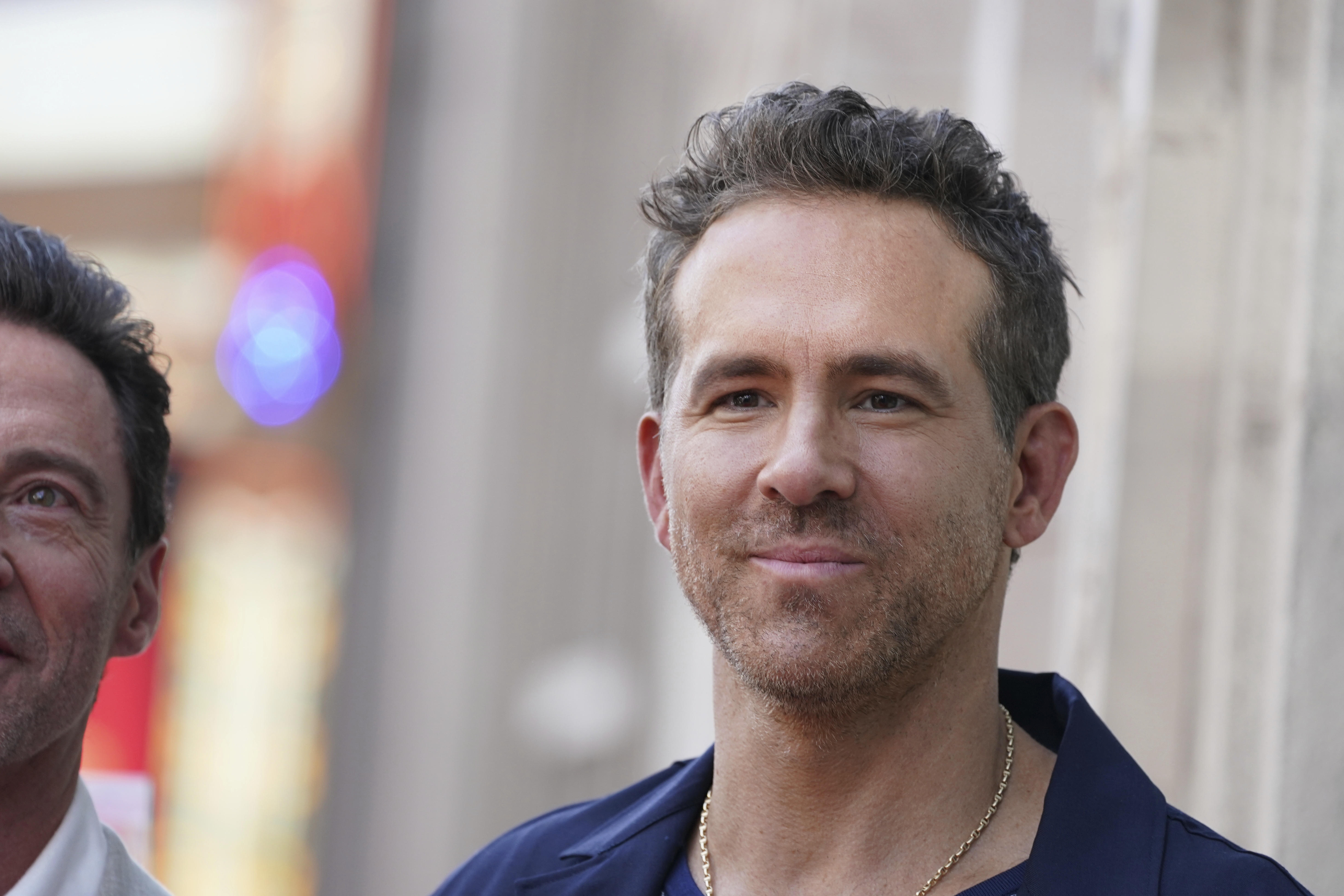 FILE - Ryan Reynolds attends a ceremony honoring Kevin Feige with a star on the Hollywood Walk of Walk of Fame, July 25, 2024, in Los Angeles.