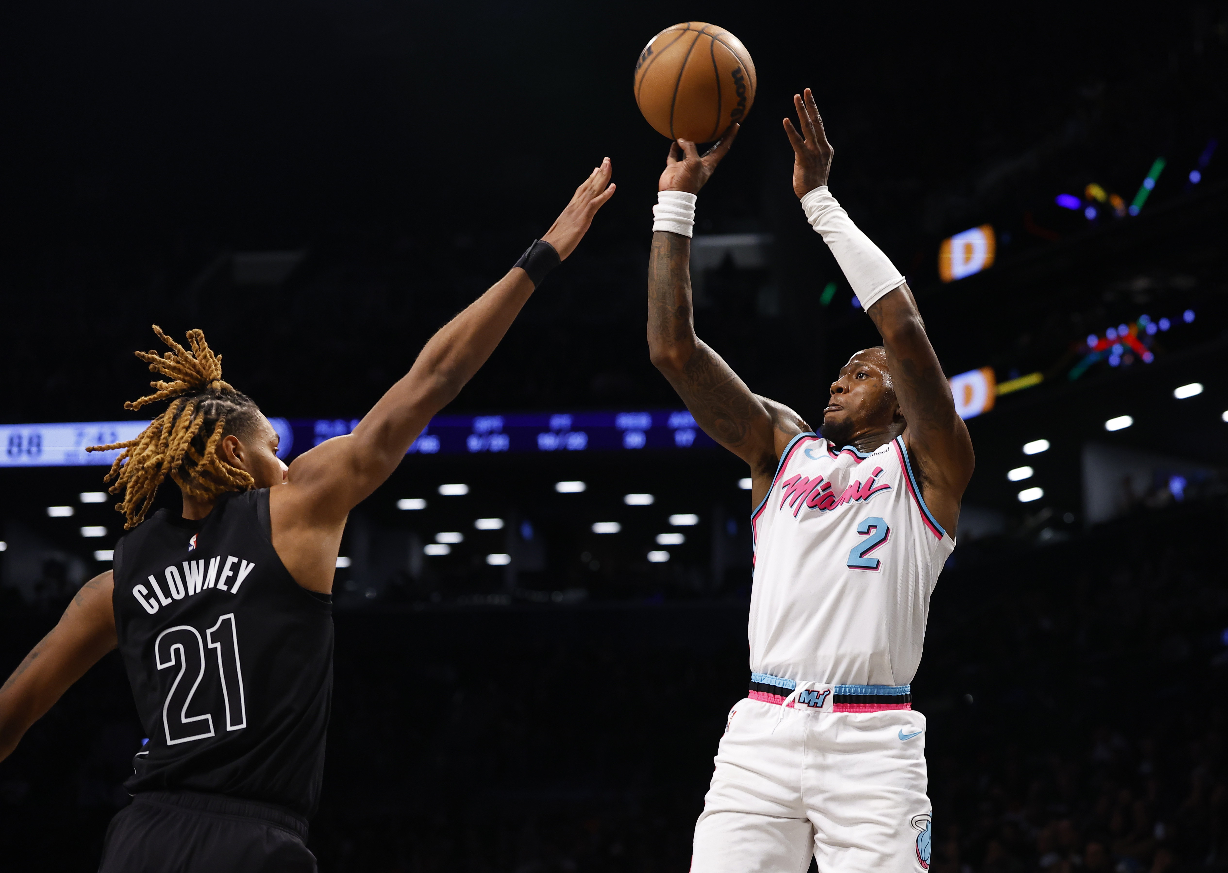 Miami Heat guard Terry Rozier (2) shoots over Brooklyn Nets forward Noah Clowney (21) during the second half of an NBA basketball game, Saturday, Jan. 25, 2025, in New York. 