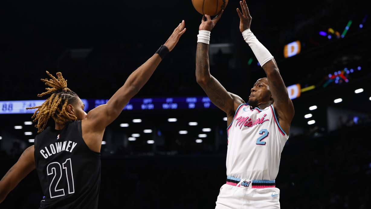 Miami Heat guard Terry Rozier (2) shoots over Brooklyn Nets forward Noah Clowney (21) during the second half of an NBA basketball game, Saturday, Jan. 25, 2025, in New York.