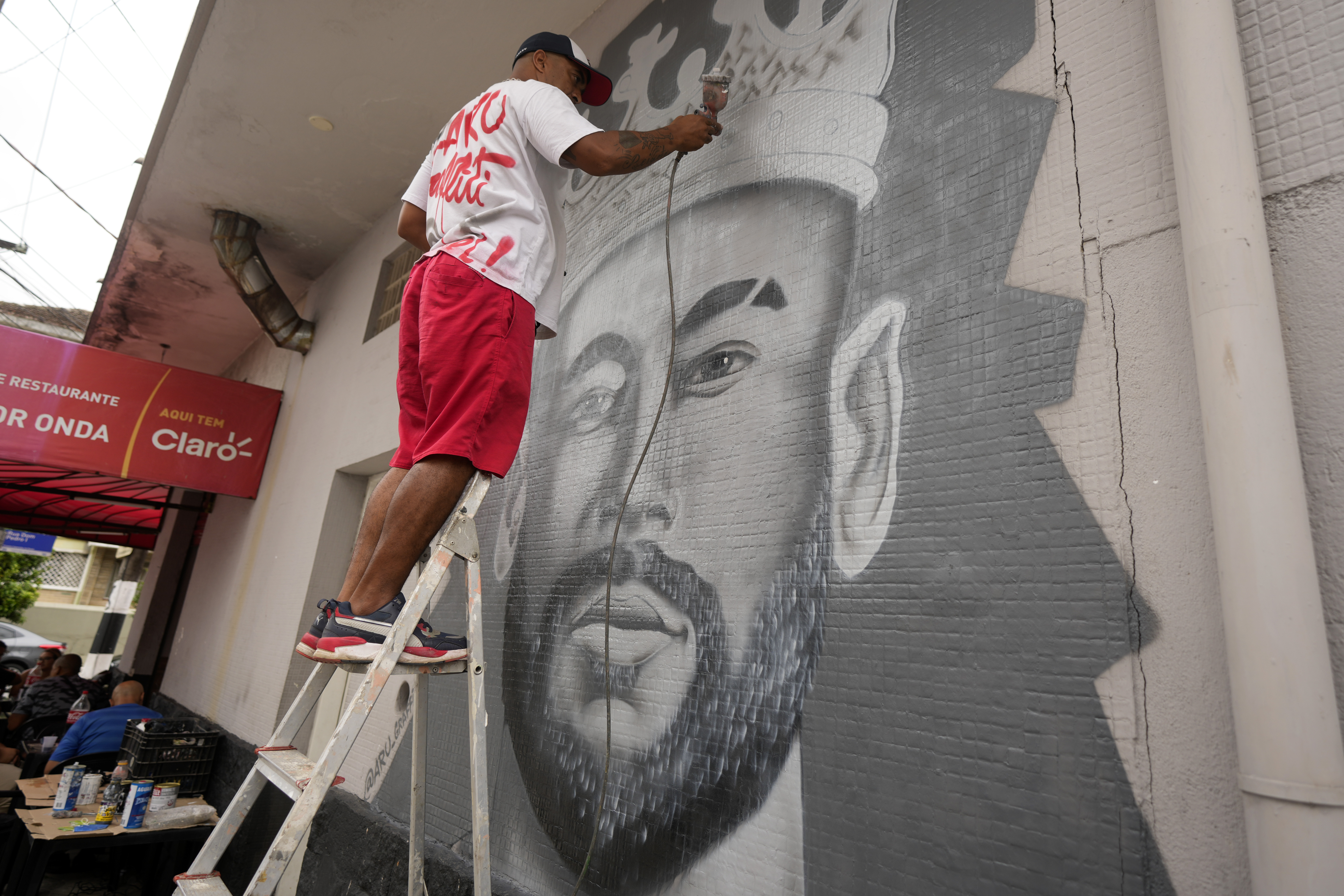A mural of Brazilian soccer player Neymar is painted next to Vila Belmiro stadium in Santos, Brazil, Friday, Jan. 31, 2025, before a ceremony presenting him as a new Santos FC player. 