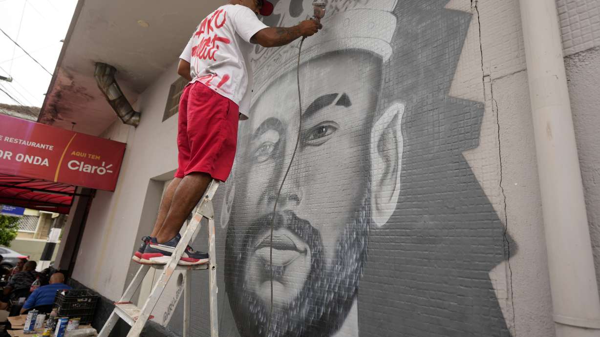 A mural of Brazilian soccer player Neymar is painted next to Vila Belmiro stadium in Santos, Brazil, Friday, Jan. 31, 2025, before a ceremony presenting him as a new Santos FC player.