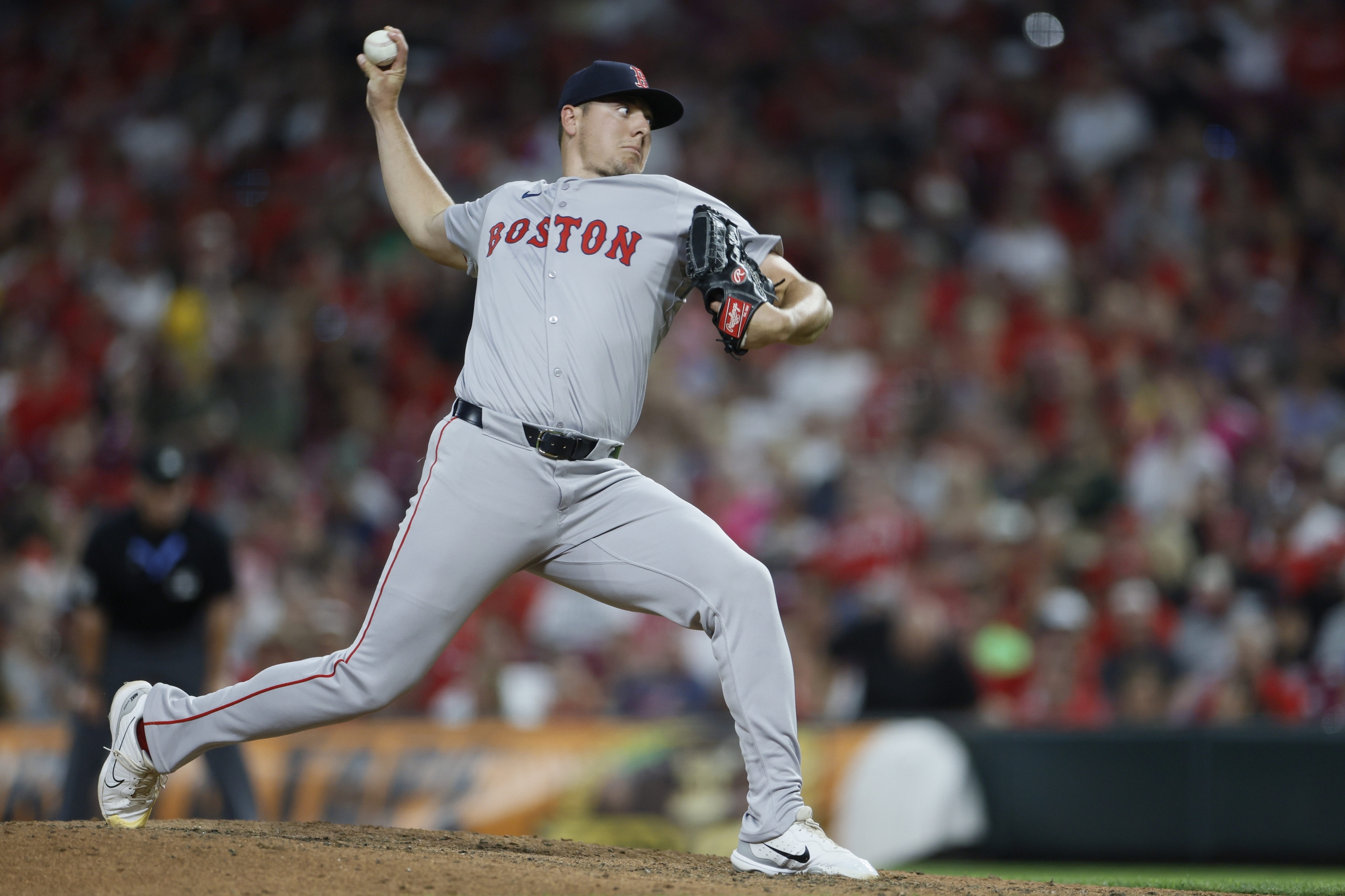 FILE - Boston Red Sox relief pitcher Brad Keller throws against the Cincinnati Reds during the eighth inning of a baseball game Friday, June 21, 2024, in Cincinnati. 