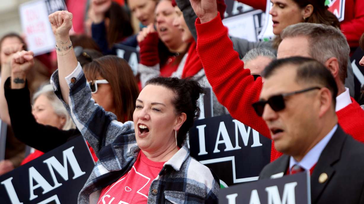 Chelsie Acosta, Salt Lake Education Association vice president, cheers with other educators and union members in opposition to HB267, Public Sector Labor Union Amendments, at the Capitol in Salt Lake City on Friday.