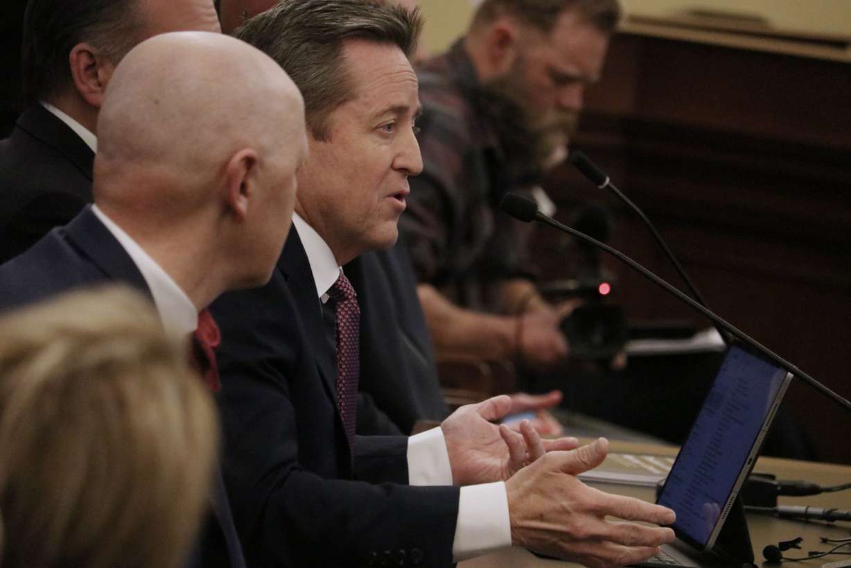 Utah Attorney General Derek Brown answers questions during a legislative audit presentation Friday on the Utah Attorney General's Office at the state Capitol.